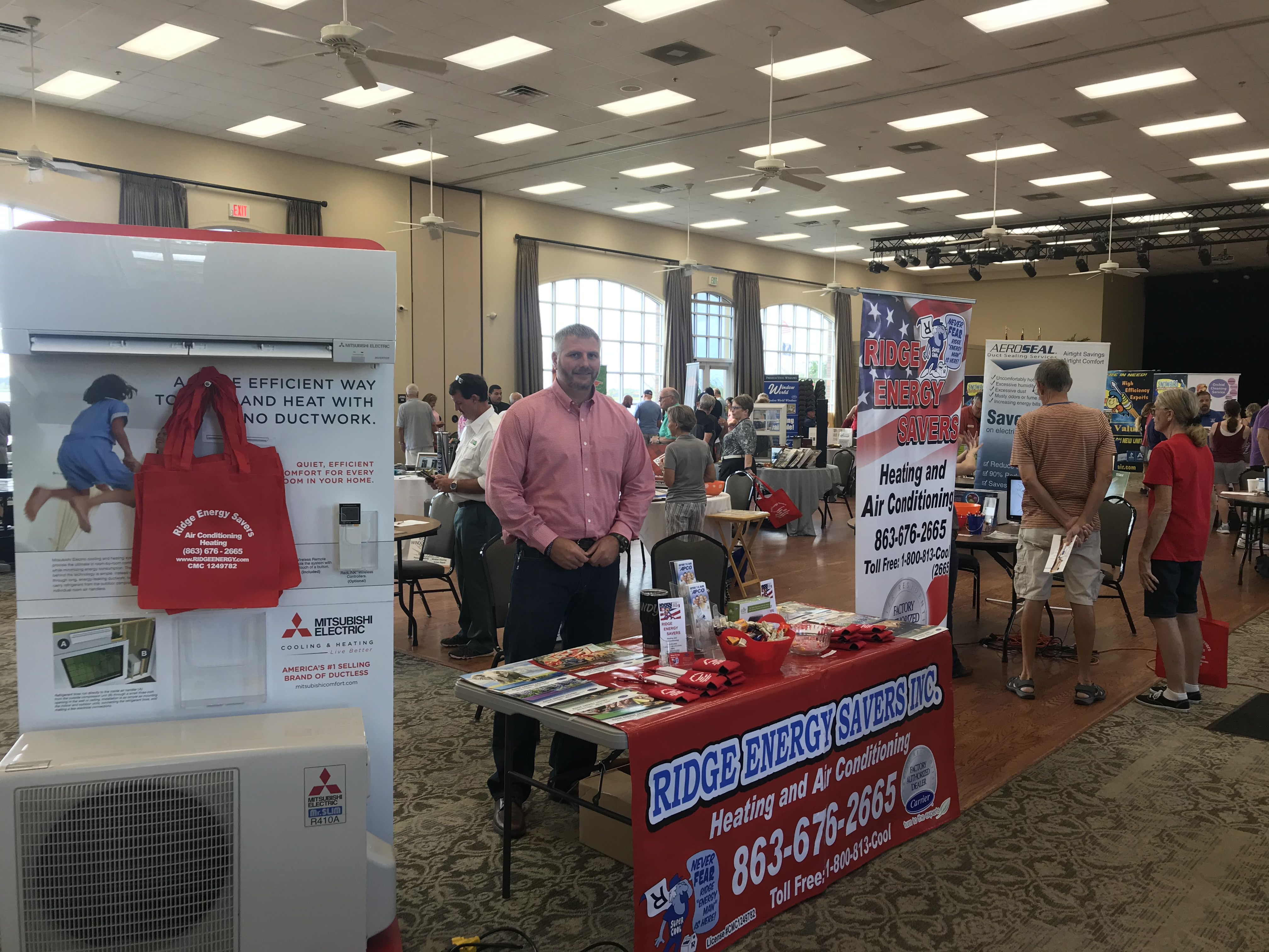 Ridge Energy Savers Inc. Heating & Air Conditioning showcases their innovative solutions at a local trade exhibition, connecting with the community and demonstrating their commitment to quality and service.