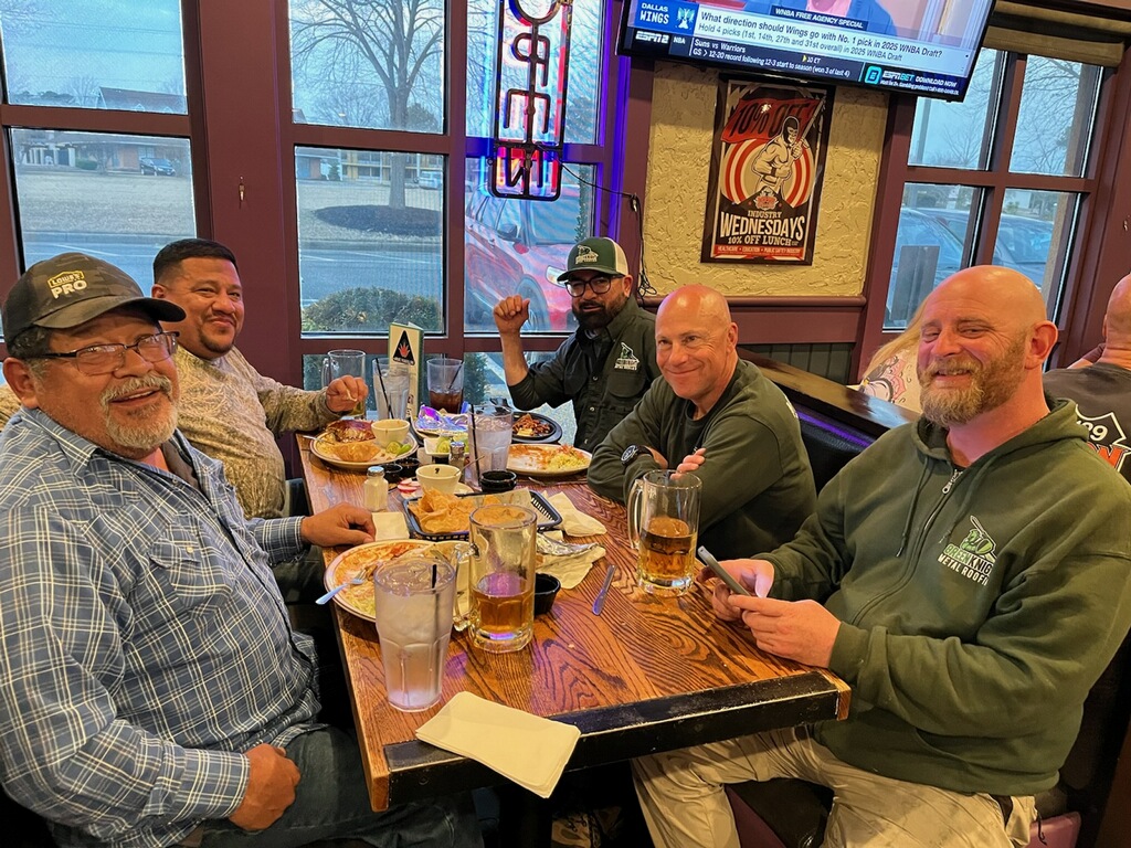 Experience the camaraderie and dedication of Green Knight® Metal Roofing, where great service and teamwork come naturally over every meal.