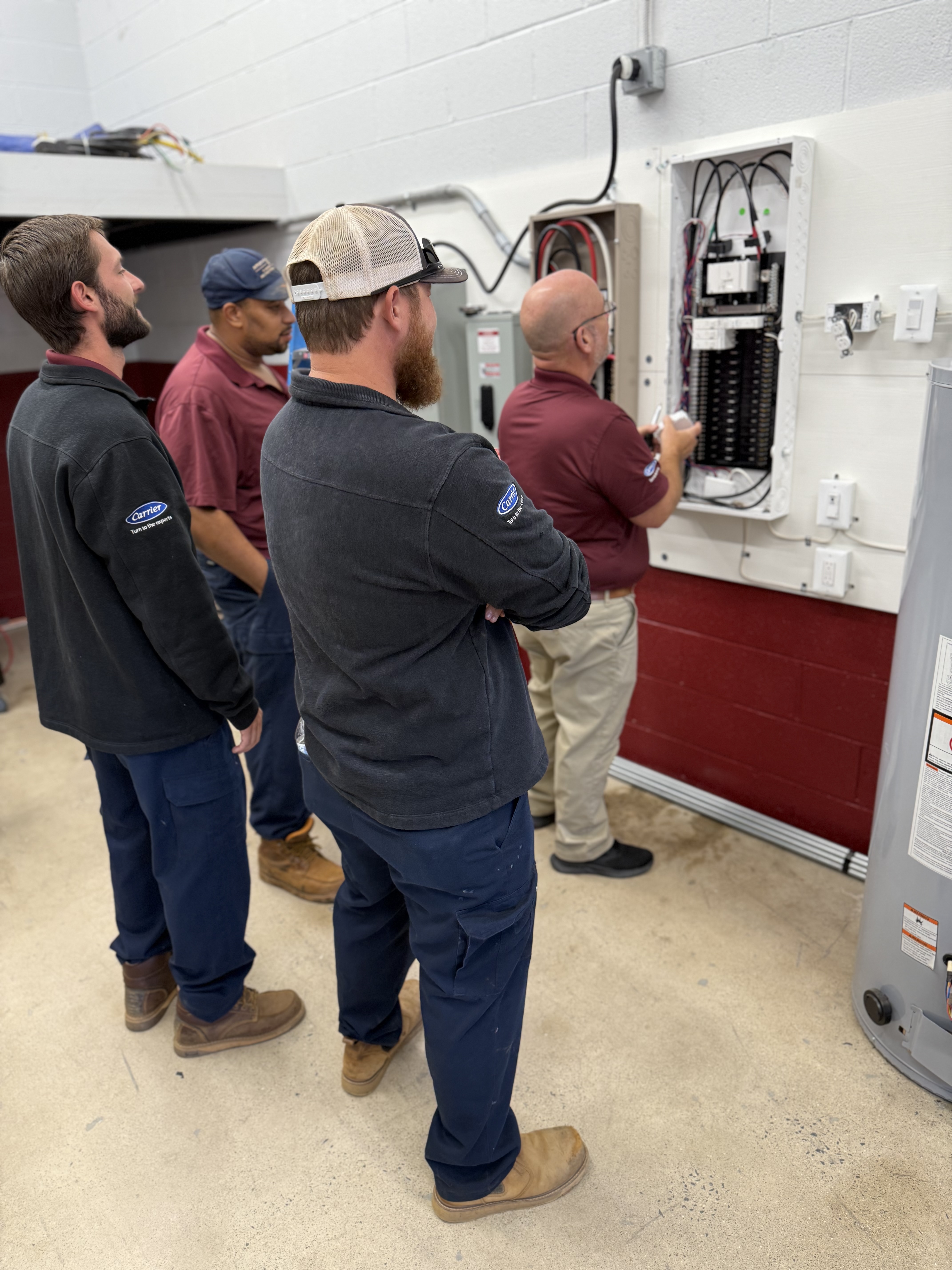Appleton Campbell showcases its professional and skilled electrical technicians at work, emphasizing high standards and reliability.