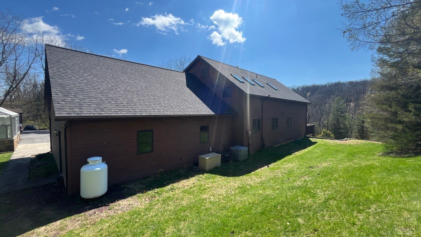 Showcasing durable craftsmanship and a clean finished roofline, Mast Roofing & Construction delivers reliable protection and curb appeal for your home.