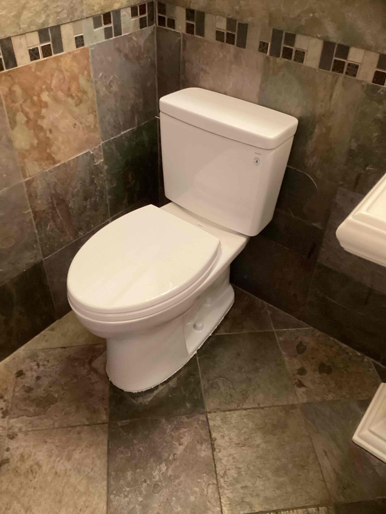 Experience premium plumbing solutions with Bell Plumbing, Heating, Cooling & Electrical, experts in quality installations like this stylish bathroom setup.