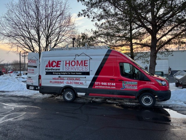 Parrish Services demonstrates dependable, professional service with clearly branded vans ready to handle heating, cooling, plumbing, and electrical needs.