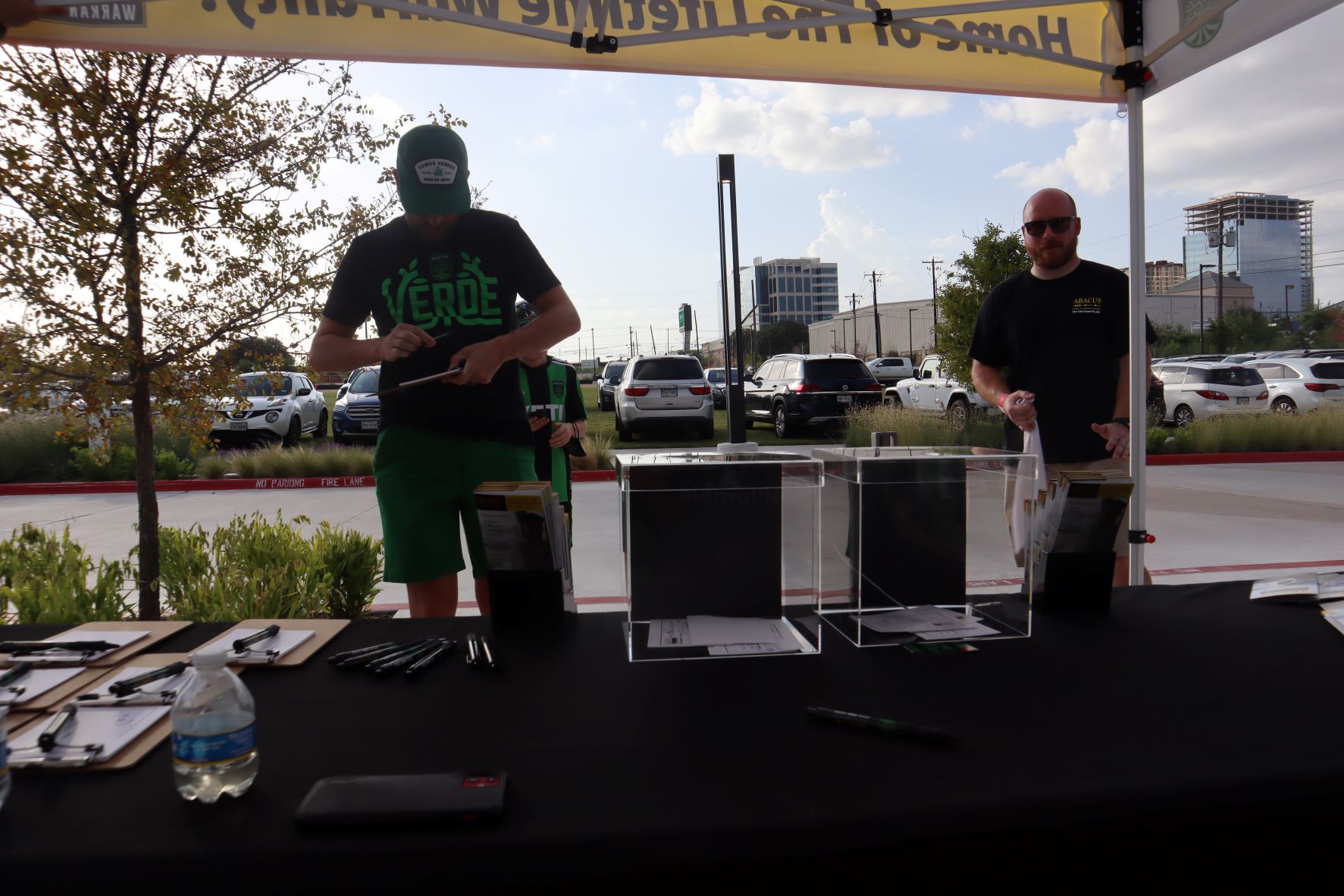 Abacus Plumbing, Air Conditioning, & Electrical greets the community with a professional booth and friendly staff ready to assist visitors.