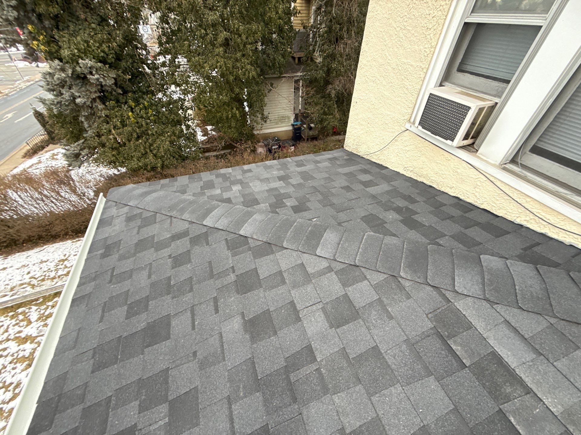 Careful craftsmanship and durable asphalt shingles protect your home, trust Mosaic Roofing & Exteriors for reliable roof installations.