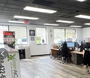 Experience quality and professionalism with Green Air Care in a vibrant and organized office setting.