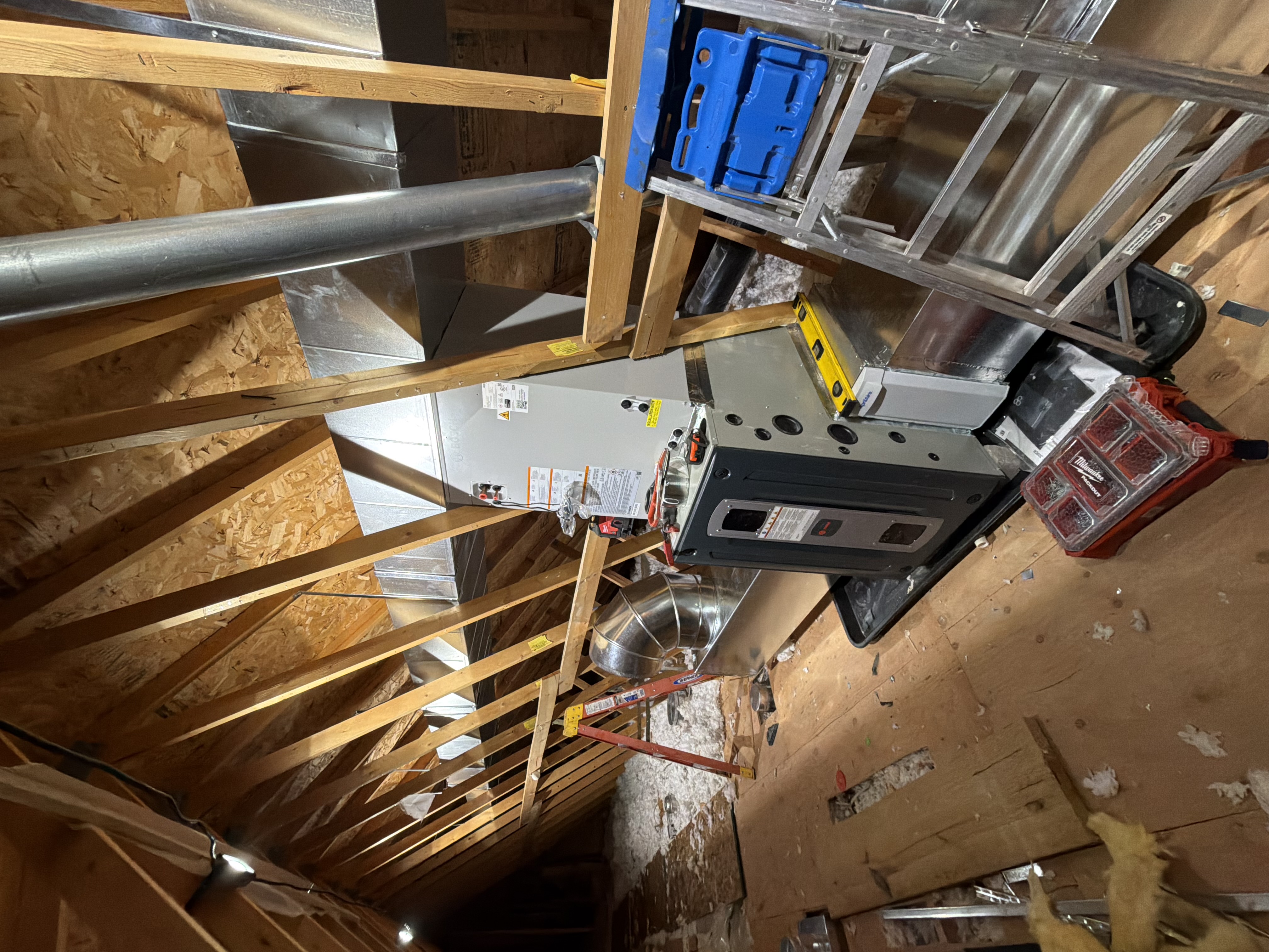 Confident furnace and duct installation in an attic shows the craftsmanship and care customers trust from Simply Mechanical AC, Furnace & Boiler Repair.