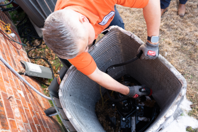 Skilled technicians from Blue Line Electric carefully inspect outdoor HVAC equipment to ensure safe, reliable operation and lasting performance.