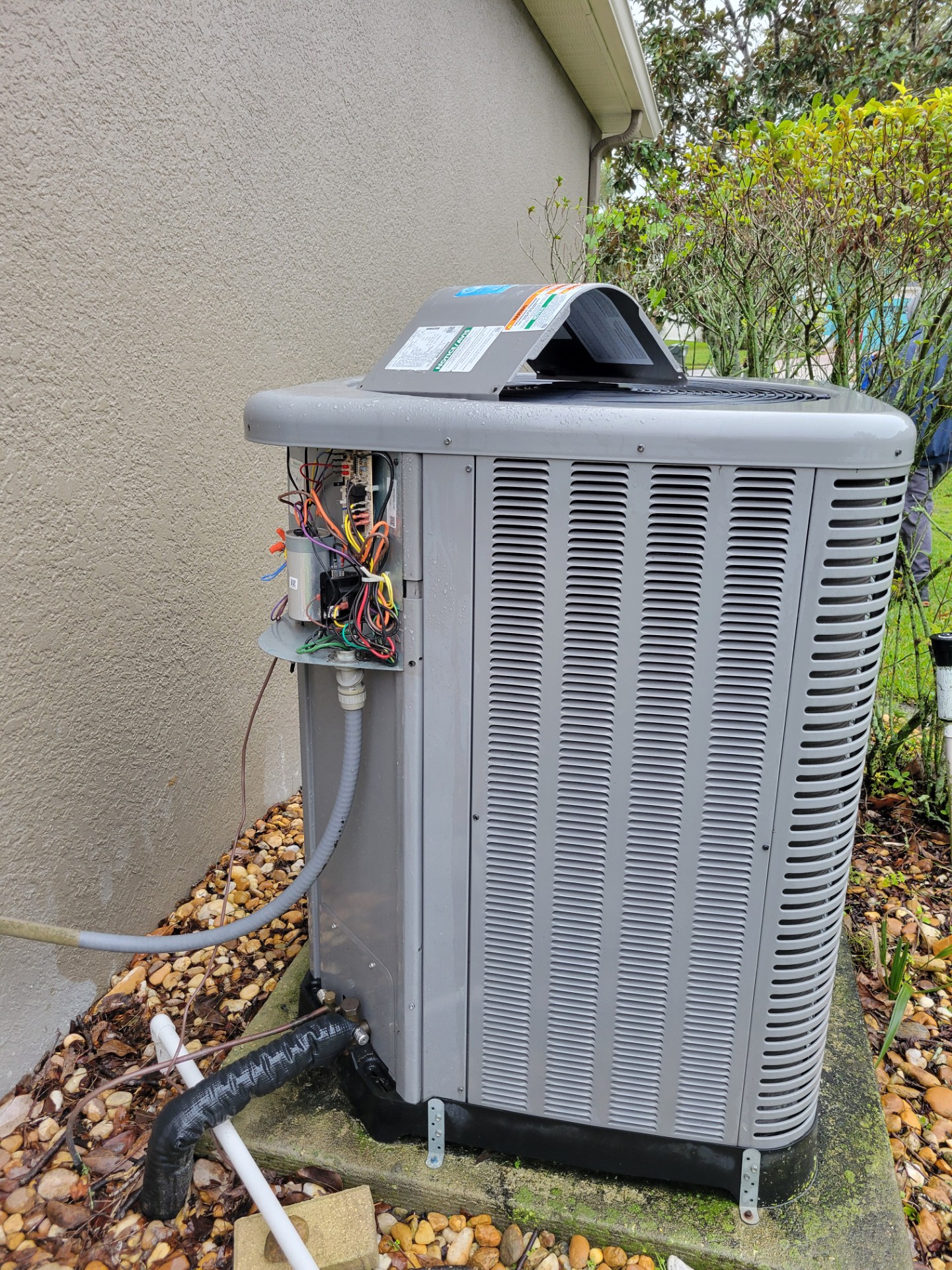 Certified Climate Control expertly manages your cooling needs by ensuring every AC unit, like the one here, operates at peak performance, even in the most challenging outdoor environments.