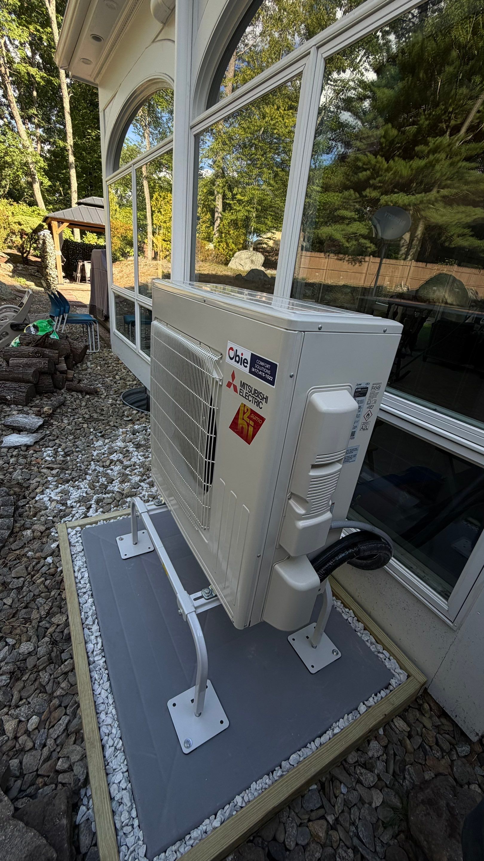 Obie Comfort Solutions installed this compact outdoor mini-split with careful mounting and tidy surroundings to showcase reliable, professional craftsmanship.