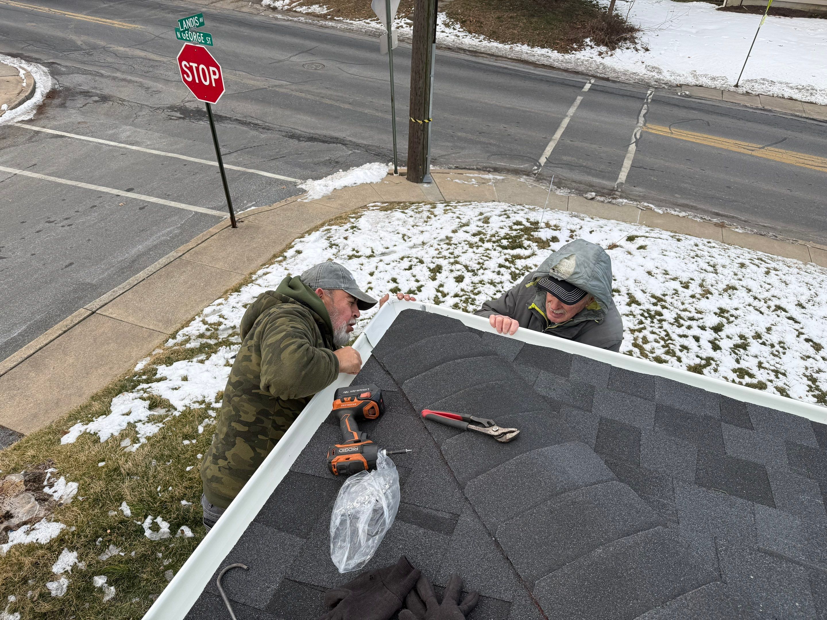 Trust Mosaic Roofing & Exteriors to deliver reliable roof and gutter repairs even in winter conditions, showcasing skilled craftsmanship and care.