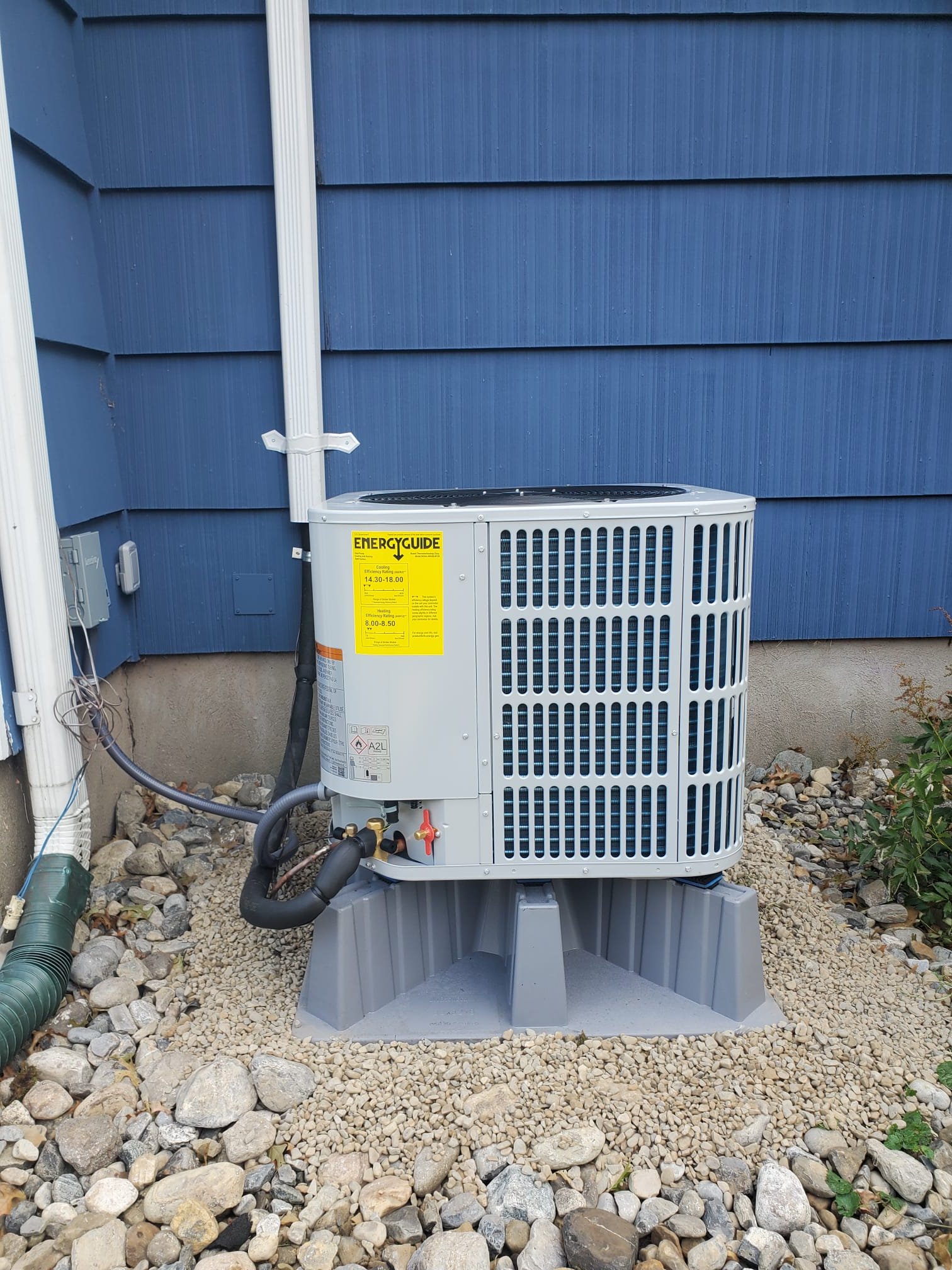 Enhance your home's comfort with the reliable HVAC solutions from Service Professionals, as shown in our efficient outdoor units perfectly installed for optimal performance.