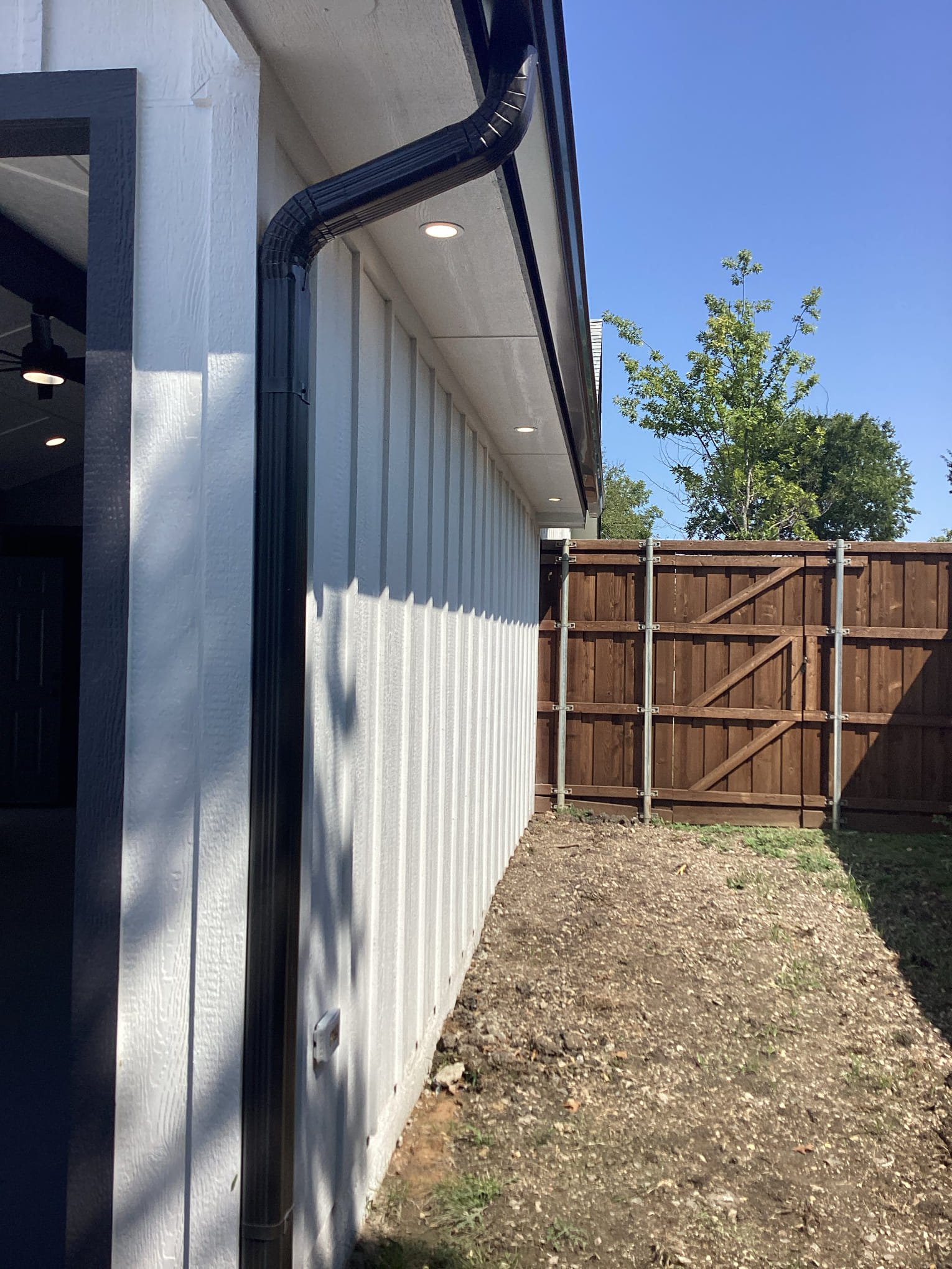 Enhance your home's exterior with Blue Line Electric's professional lighting and gutter solutions for lasting value.