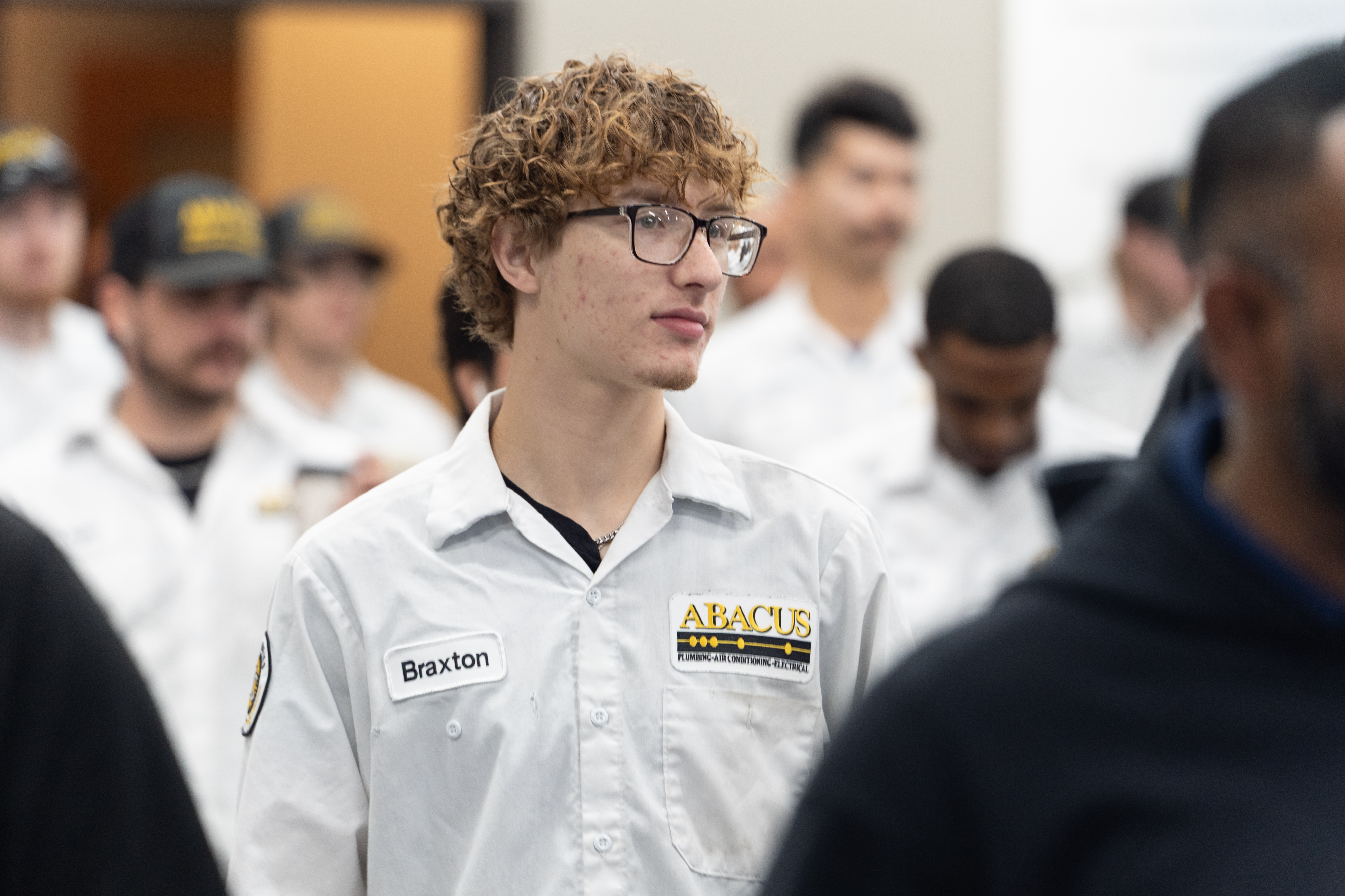 Confident and team-focused, Abacus Plumbing, Air Conditioning, & Electrical presents a professional crew ready to deliver reliable service with pride.