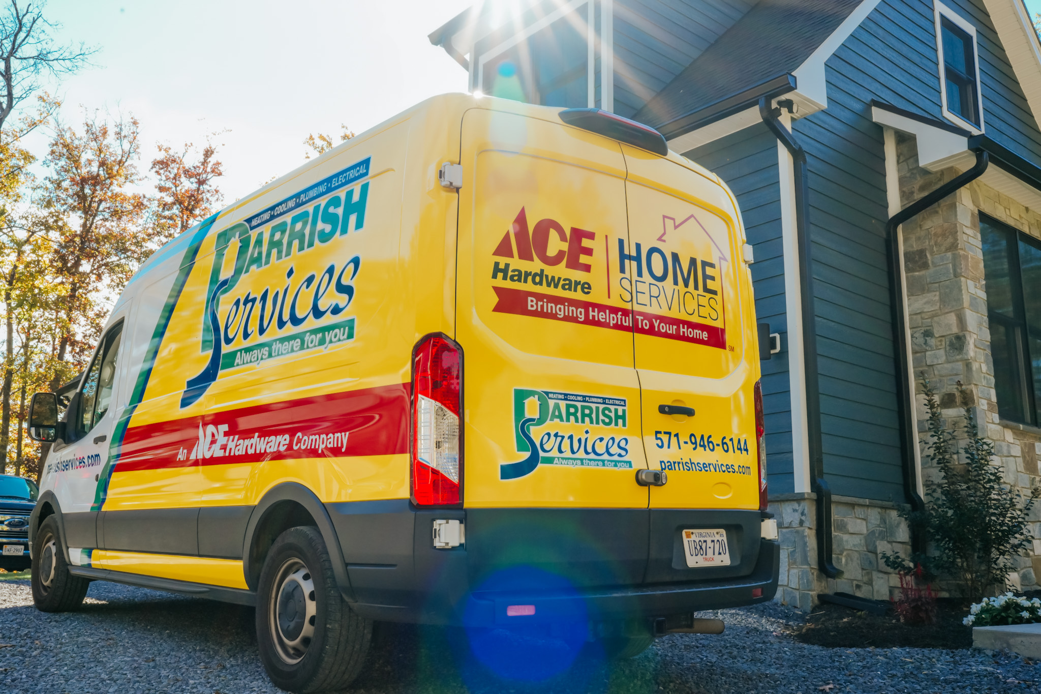 Parrish Services shows dependable, professional home service presence with clearly branded vans and visible contact details for fast homeowner support.