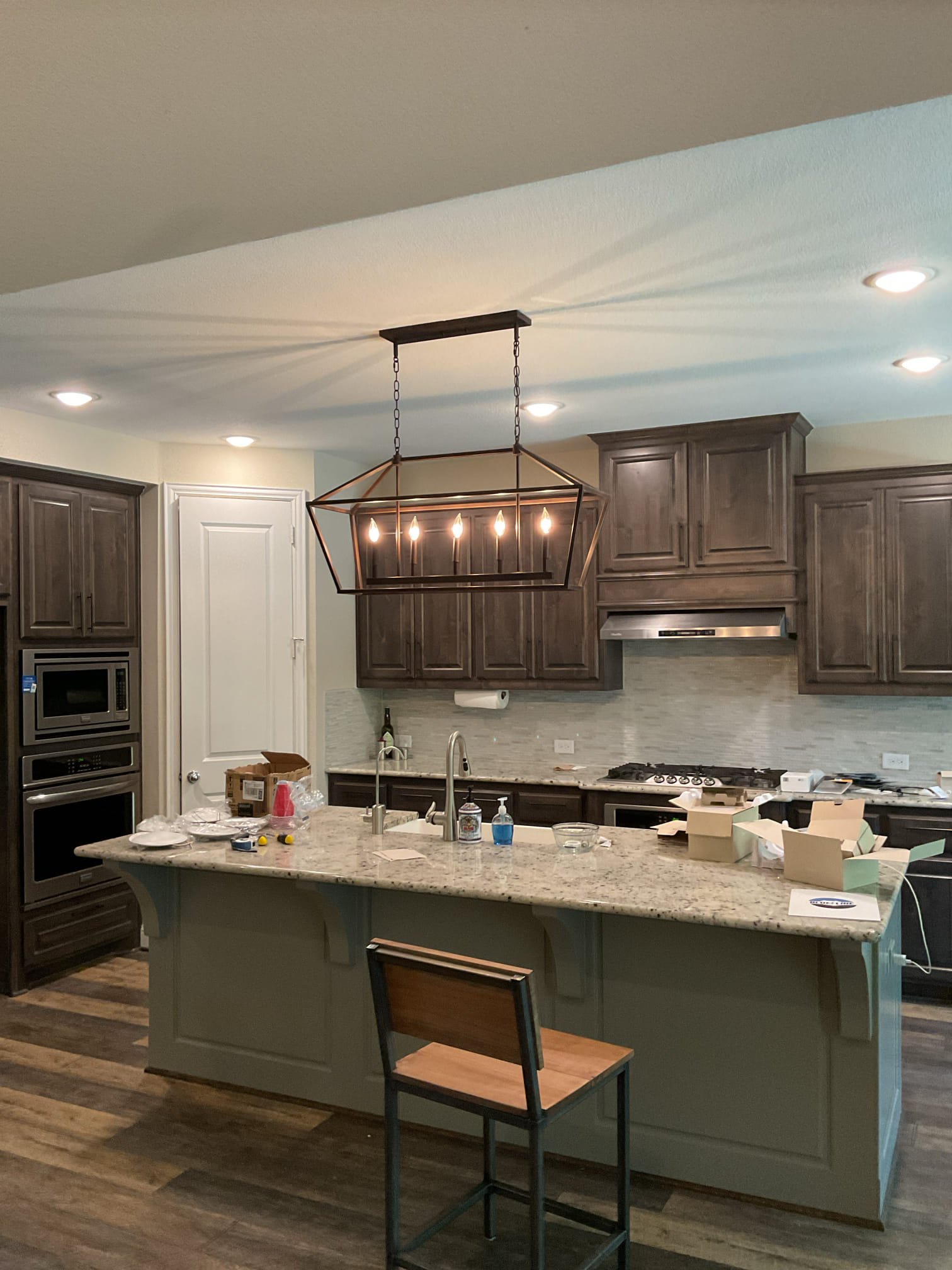 Illuminate your kitchen with elegance and efficiency, courtesy of Blue Line Electric's professional lighting upgrades.
