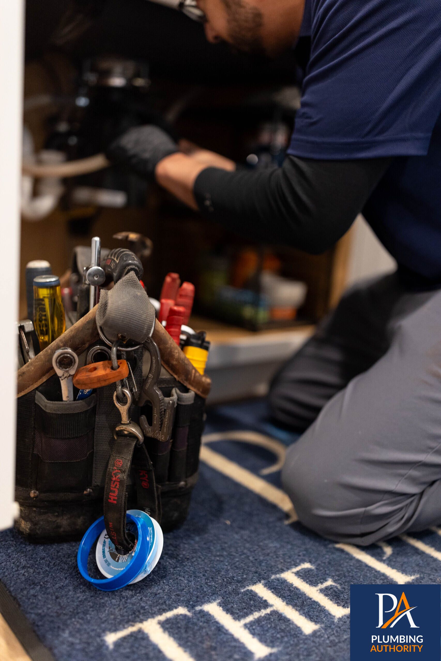 Trusted, detail-oriented plumbing service from The Plumbing Authority, showing skilled technicians delivering tidy, reliable repairs inside your home.
