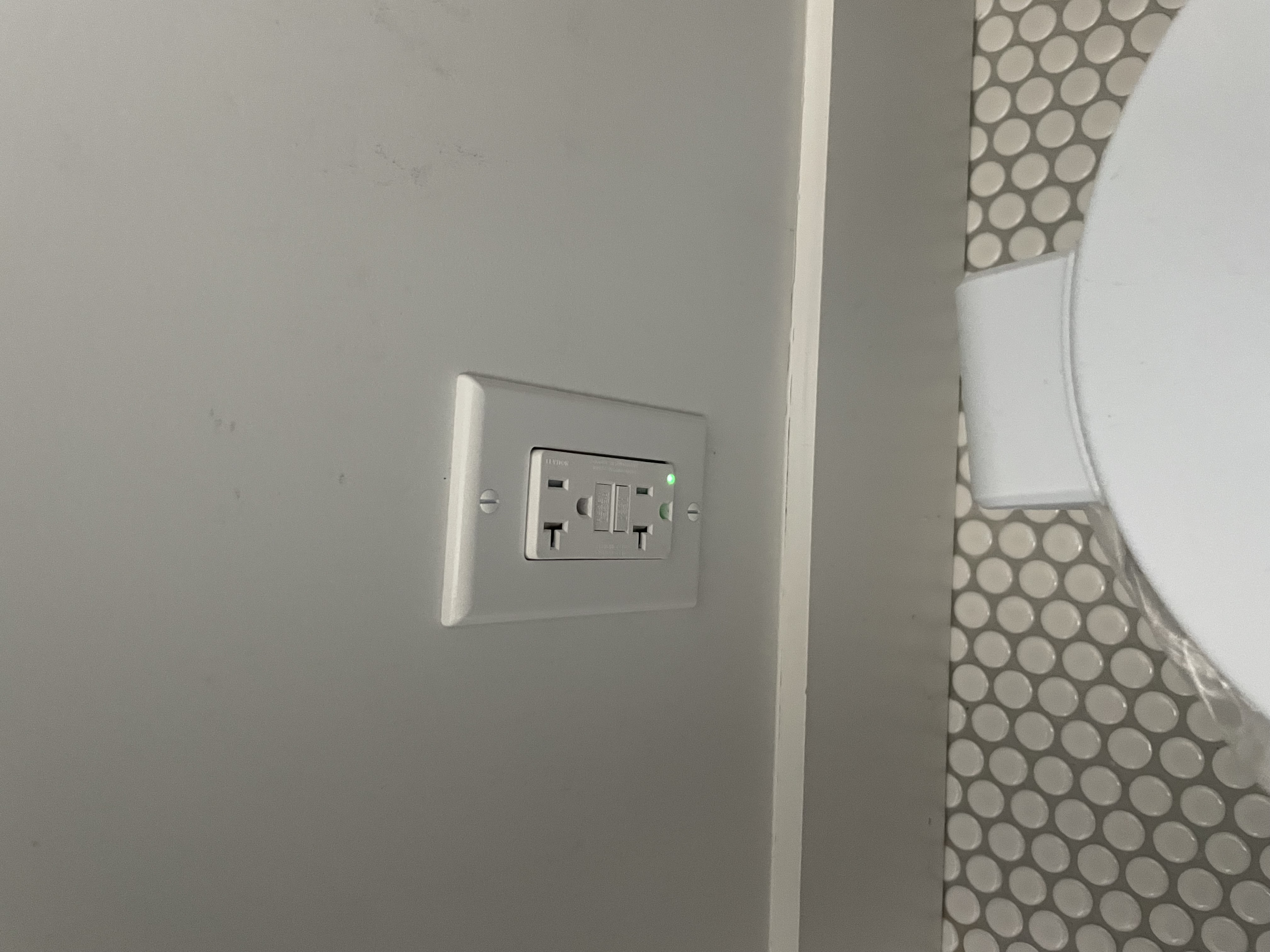 Powell Electric installed a reliable GFCI outlet to protect your bathroom circuits, demonstrating safe, high quality workmanship.