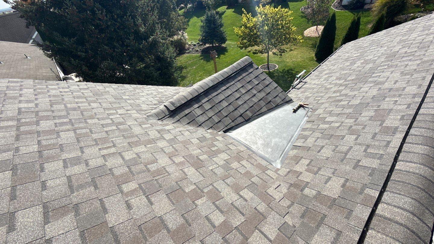 Mosaic Roofing & Exteriors showcases precise shingle work and durable valley flashing to protect your home with dependable craftsmanship.