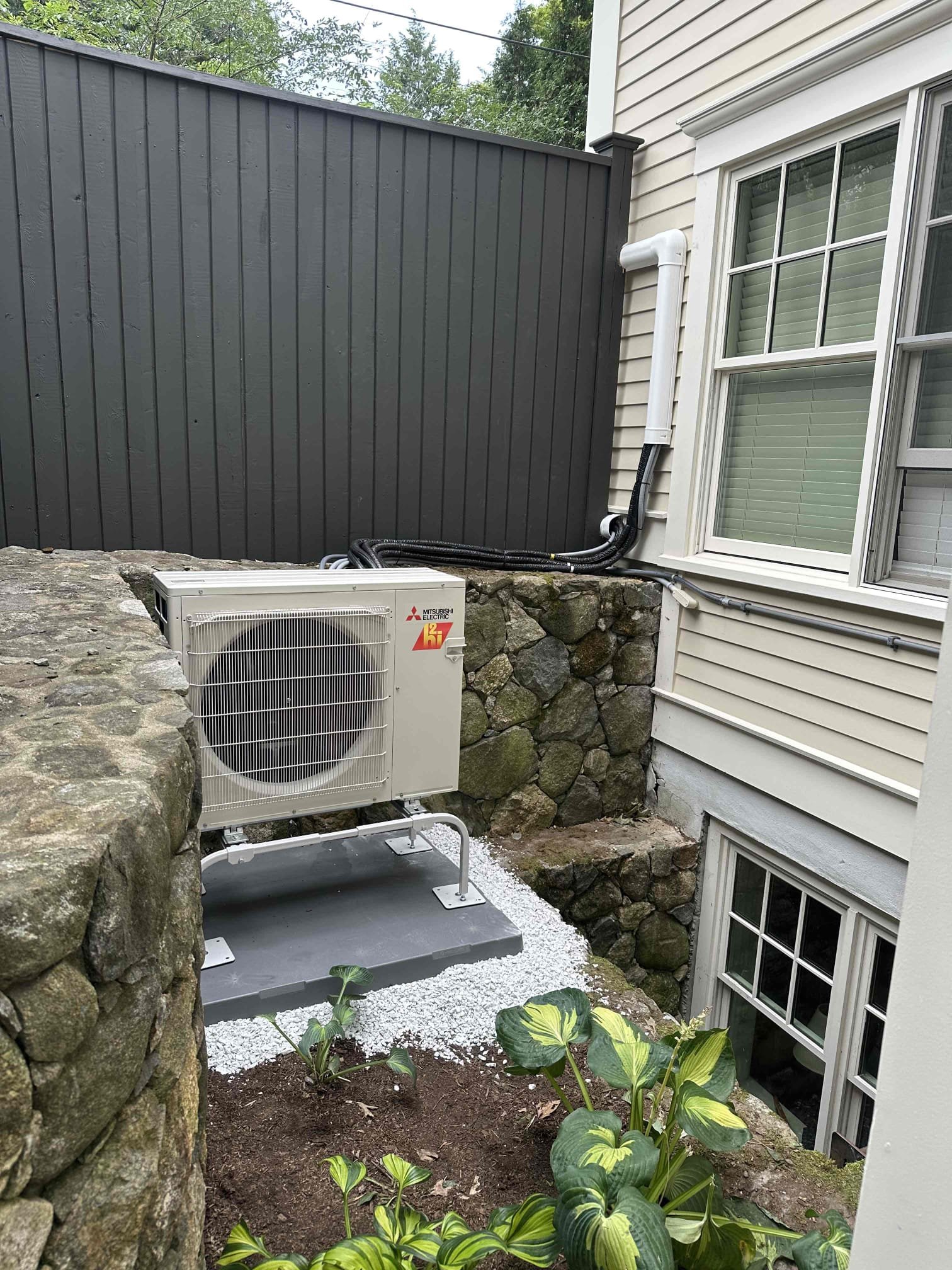 A clean, professionally mounted mini-split installation by Akian Plumbing, Heating, Cooling & Electric demonstrates durable craftsmanship and attention to detail.