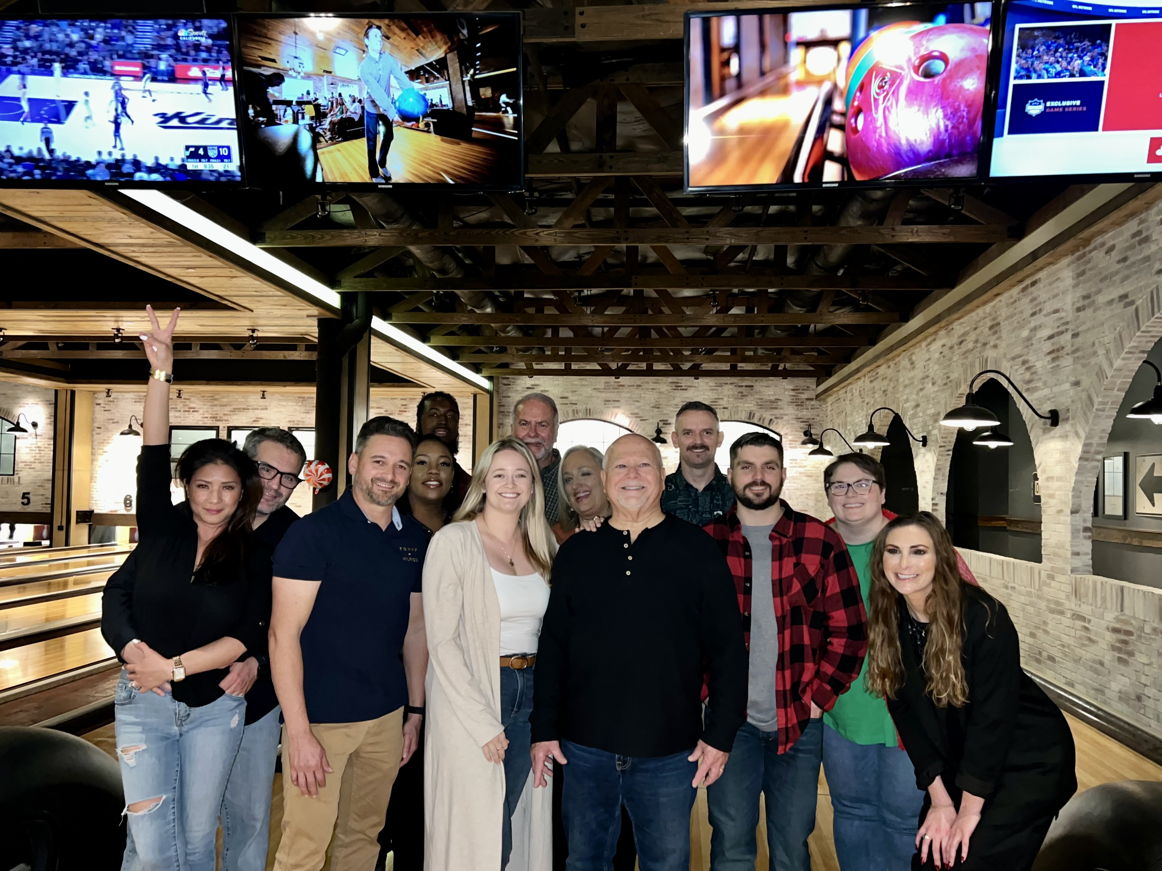 A positive team moment at a local bowling night highlights the friendly culture customers expect from West Houston Electric, Inc.