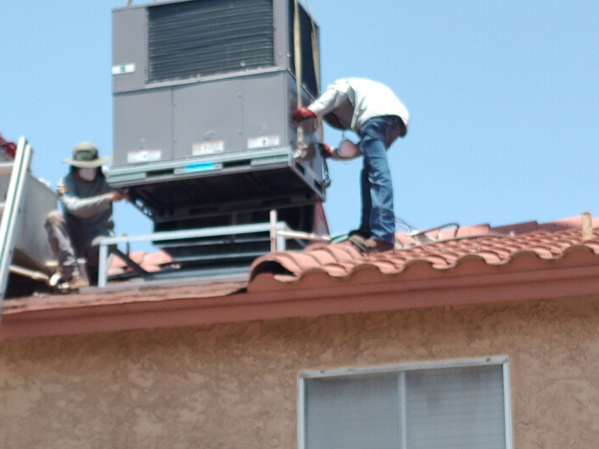 Shamrock Heating & Cooling expertly handling your rooftop HVAC needs, ensuring quality and safety every step of the way.
