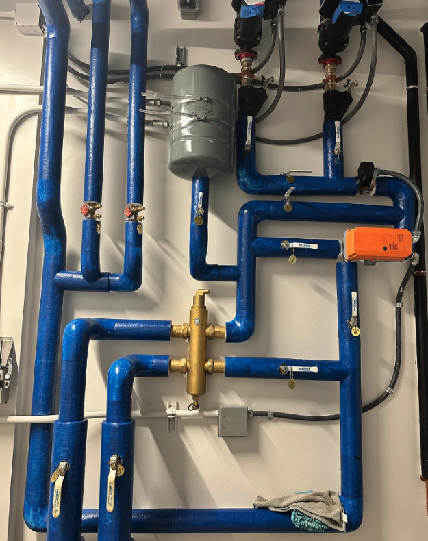 Hope Plumbing shows meticulous craftsmanship and organized plumbing systems designed for durability and easy maintenance.