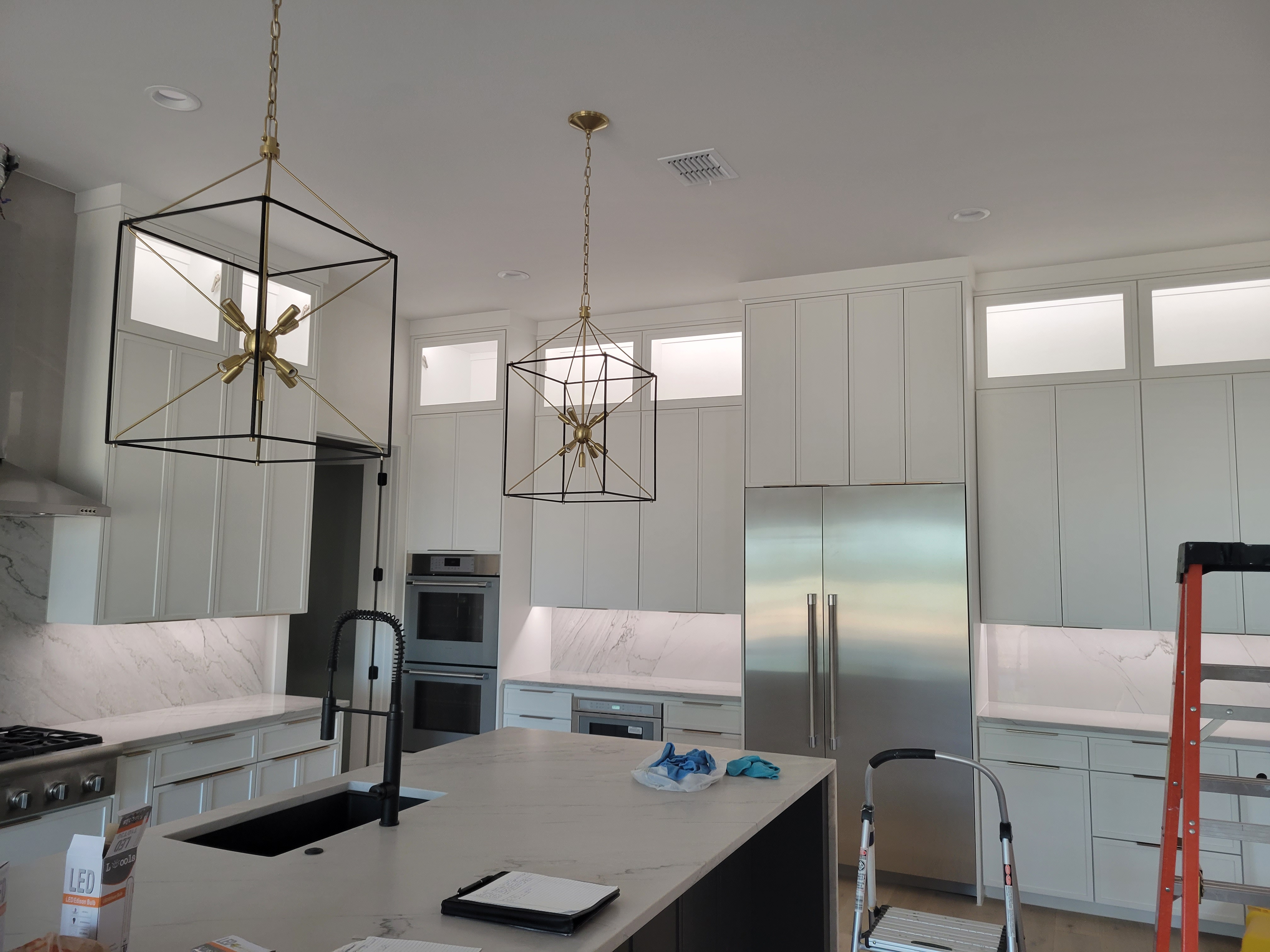 Enhance your home with Blue Line Electric's expert lighting installation for a modern and efficient kitchen.