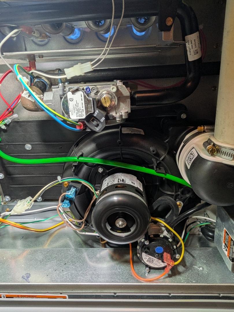 Skilled technicians at Windy City HVAC Repair ensure clean, reliable furnace performance with careful wiring and precise component servicing.