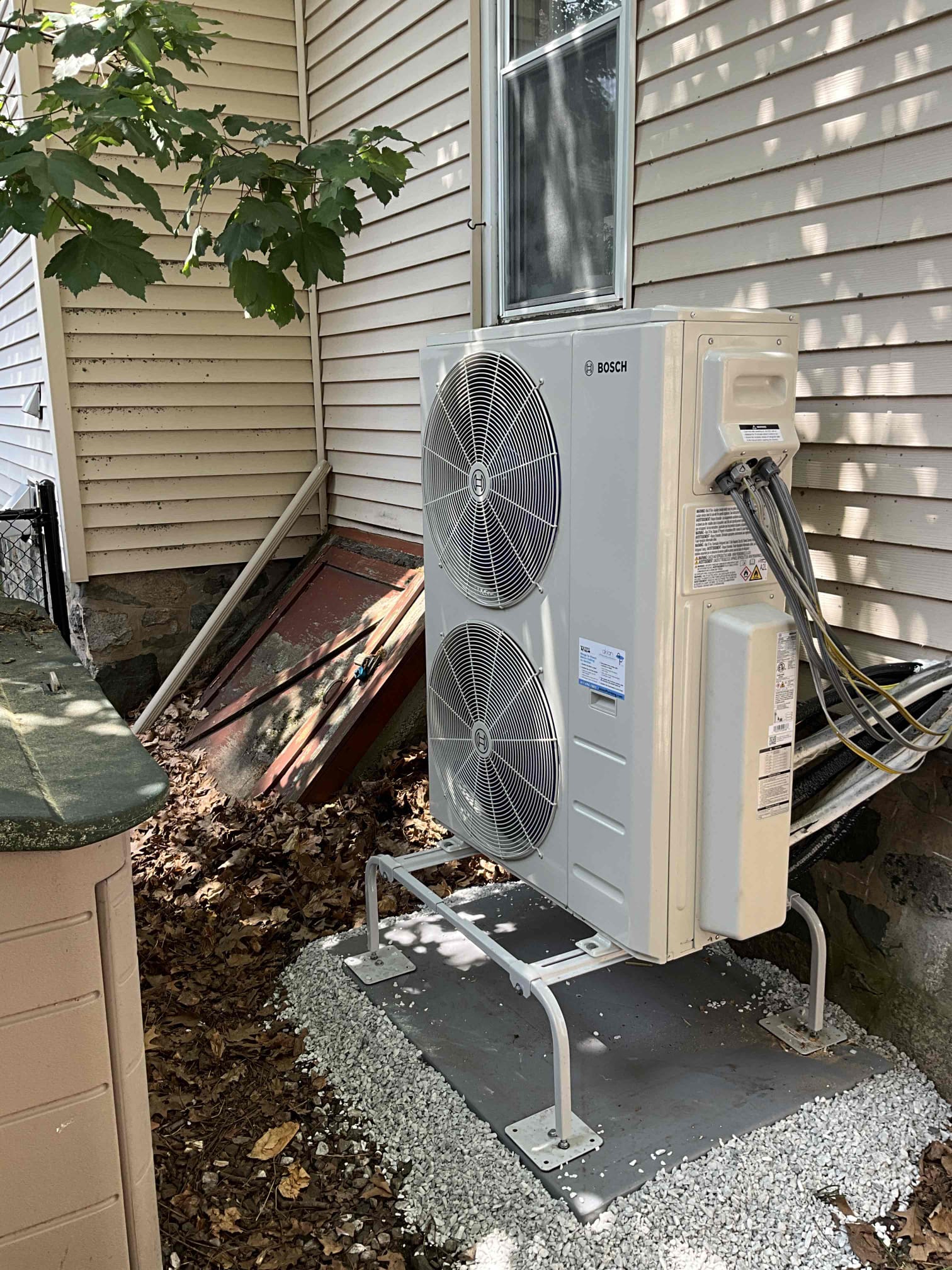 Akian Plumbing, Heating, Cooling & Electric installed this tidy Bosch mini-split outdoors, delivering reliable performance and professional long-term durability.