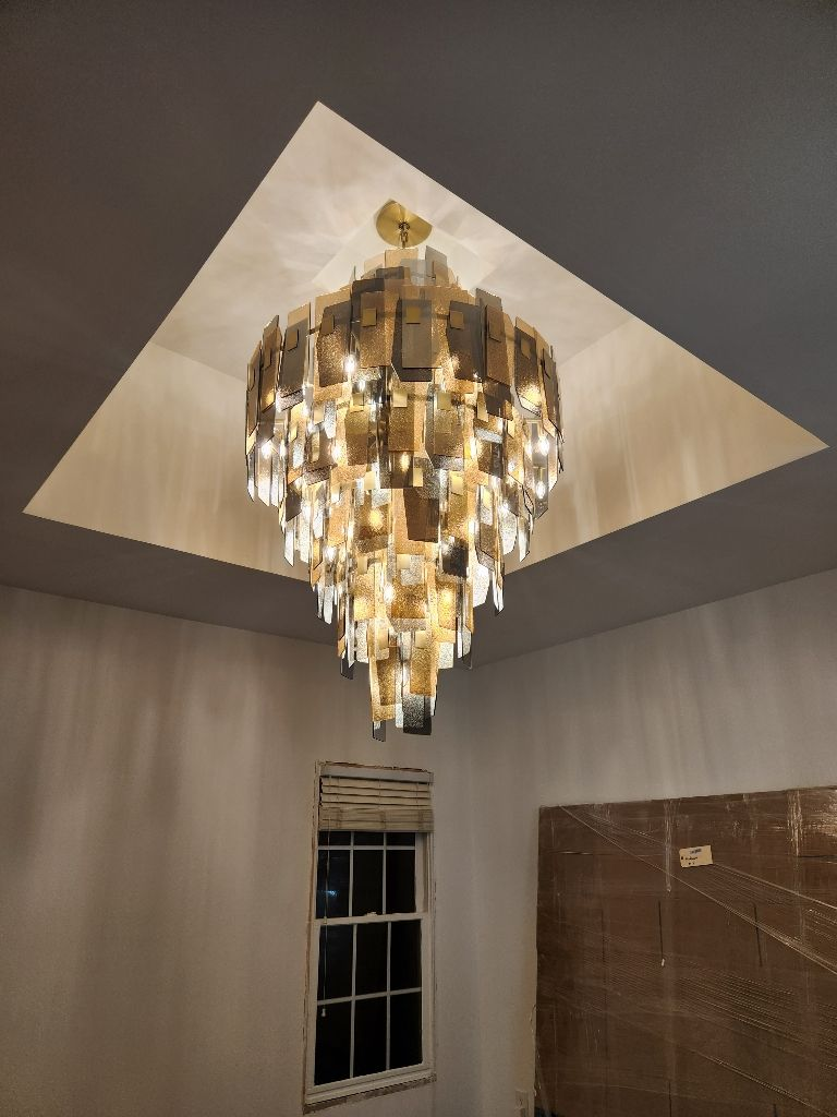 Illuminate your space with Aardvark Electric, Inc.'s expert lighting installation services, ensuring quality and elegance in every detail.