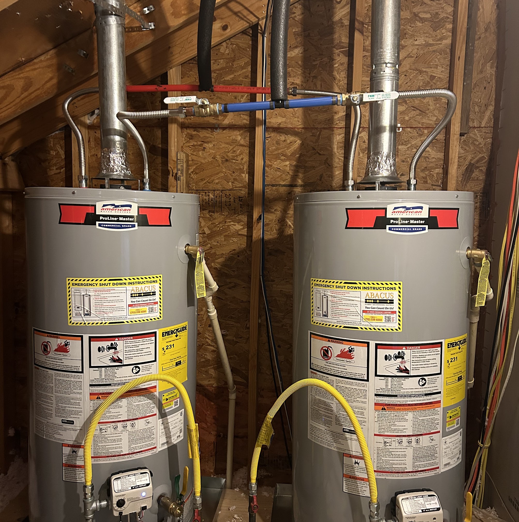 Clean, code-conscious installation of dual water heaters shows the craftsmanship and safety focus customers trust from Abacus Plumbing, Air Conditioning & Electrical.
