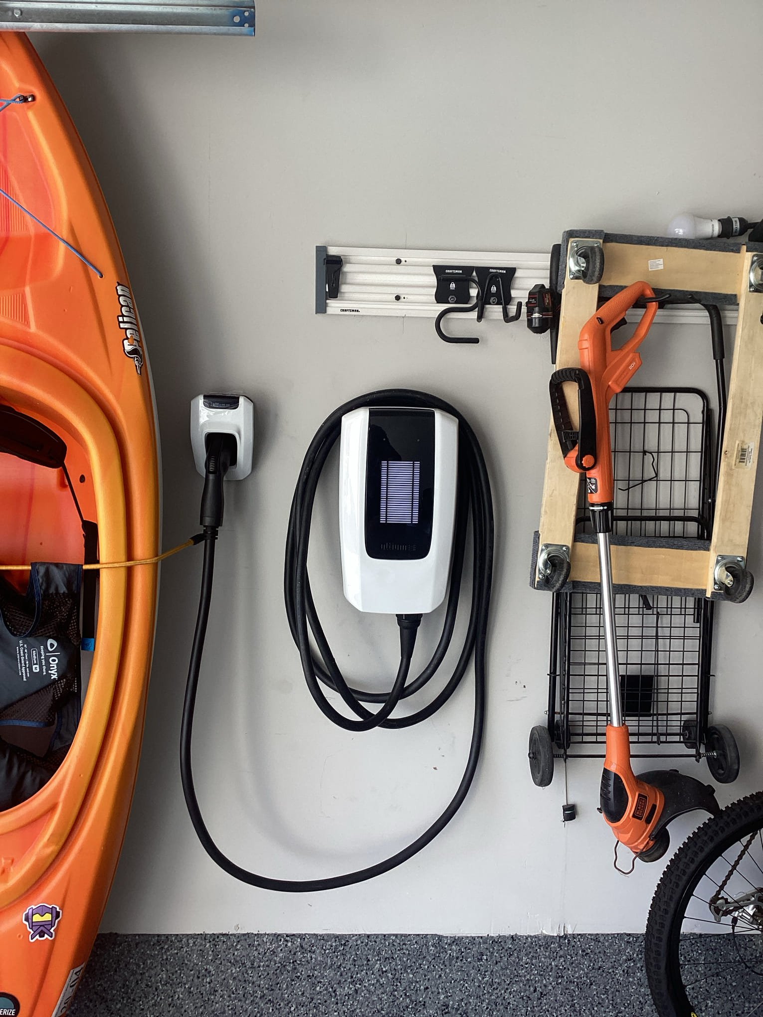 Enhance your garage with professional EV charger installation by A Team Home Services.