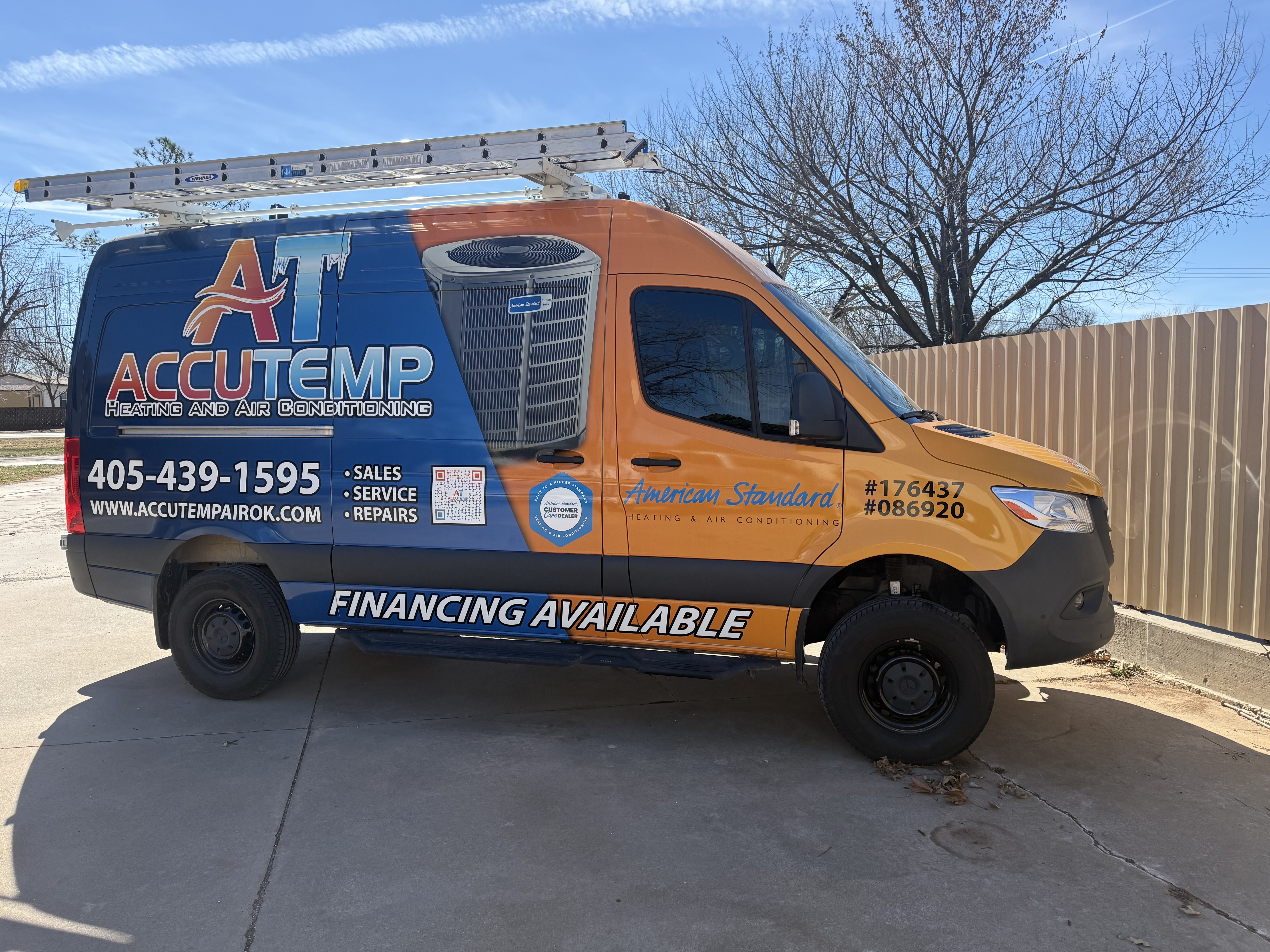 Trust AccuTemp Heating & Air Conditioning for reliable on-site HVAC service, showcased by our branded service van and clear contact info.