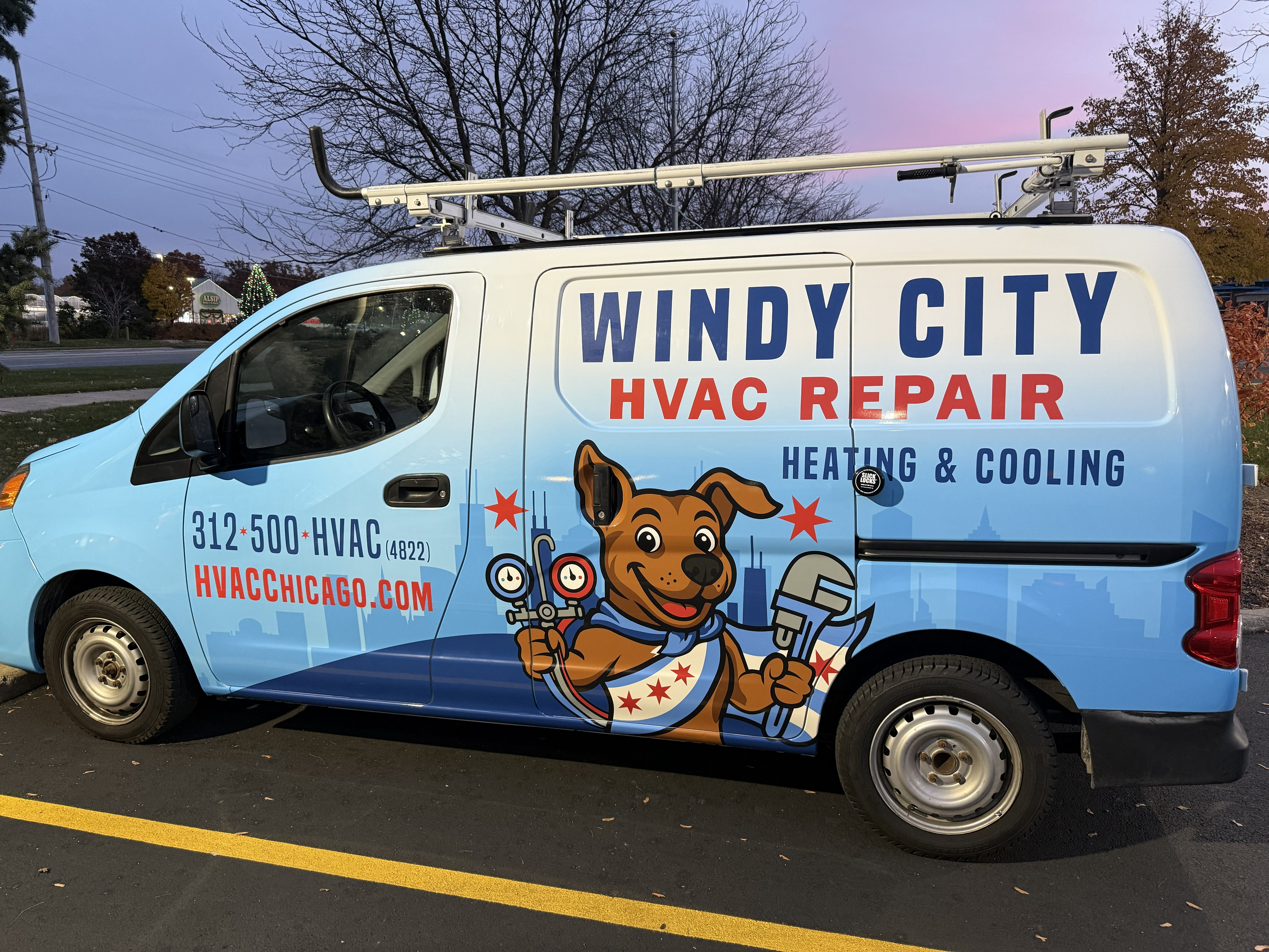Trust Windy City HVAC Repair for friendly, reliable heating and cooling service, with clear contact info and professional vehicle signage.