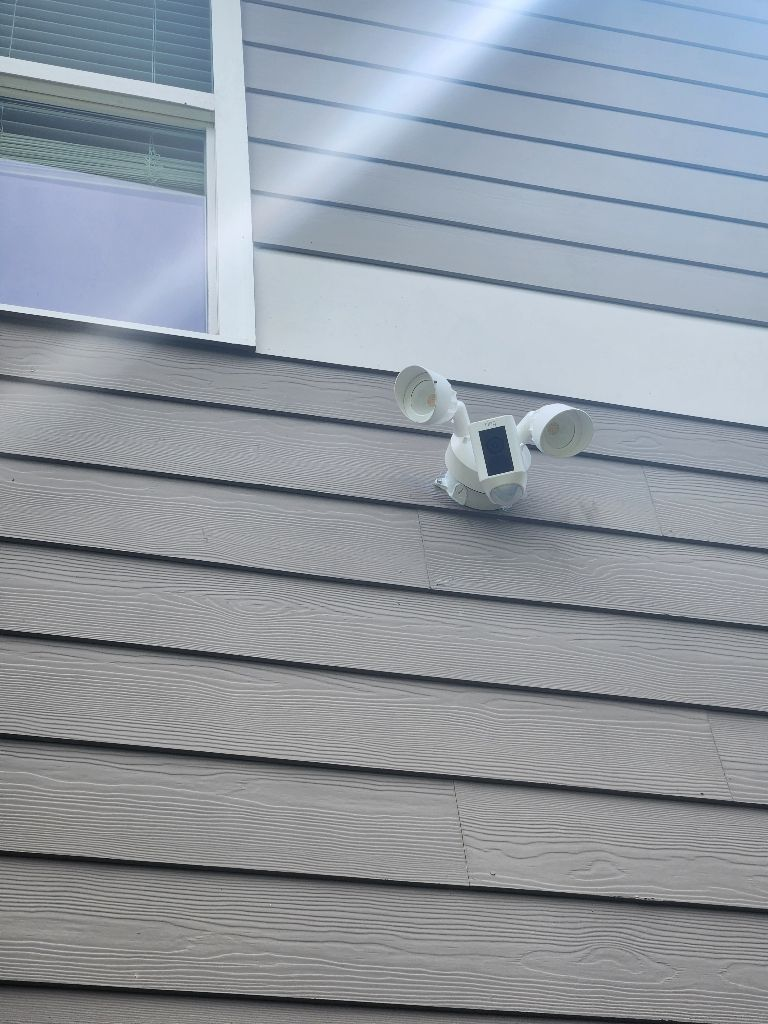 Enhance your home's security and elegance with expertly installed floodlight cameras by Aardvark Electric, Inc.