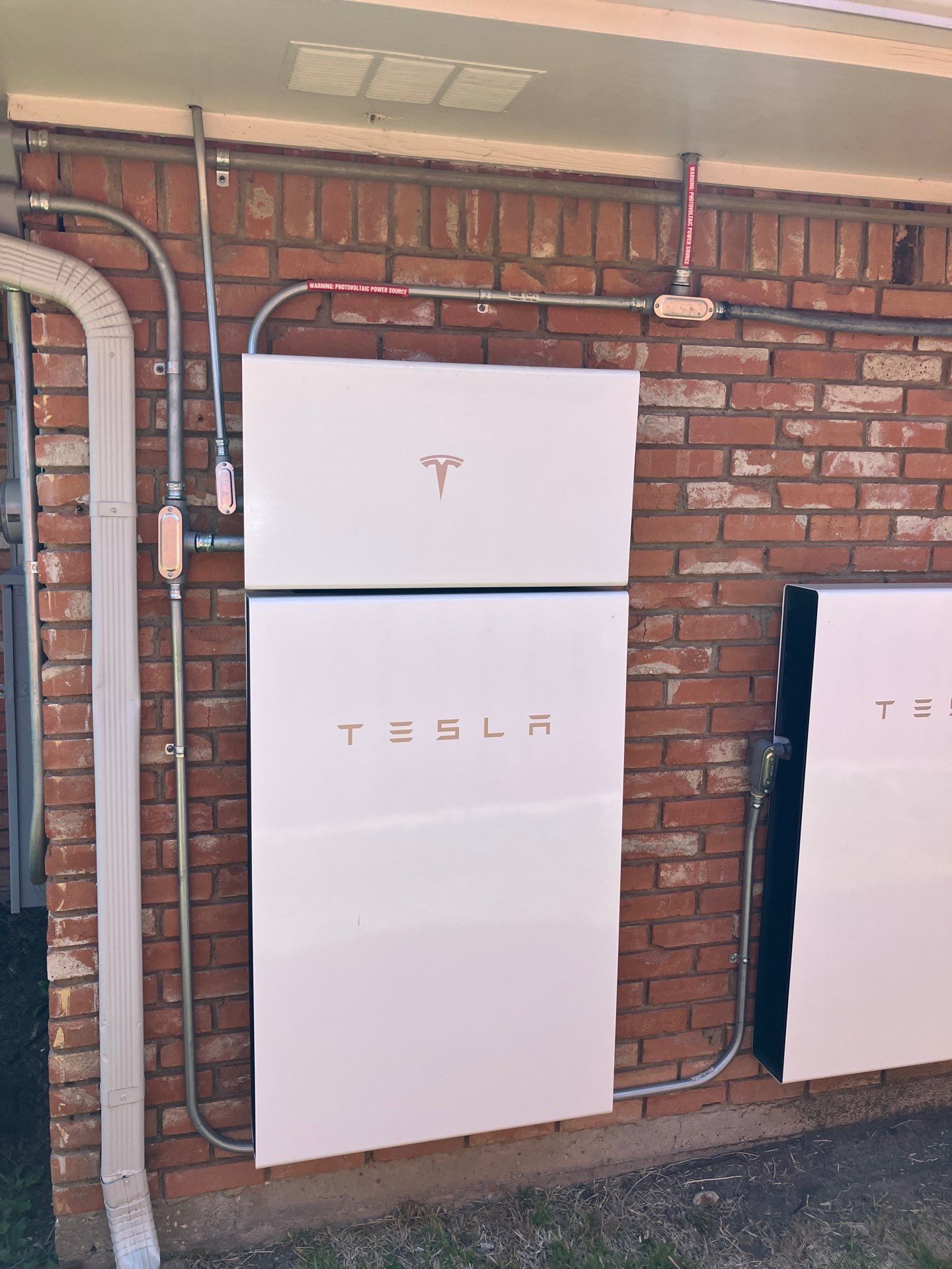 Experience cutting-edge electrical solutions with Milestone Electric's professional Tesla battery installations.
