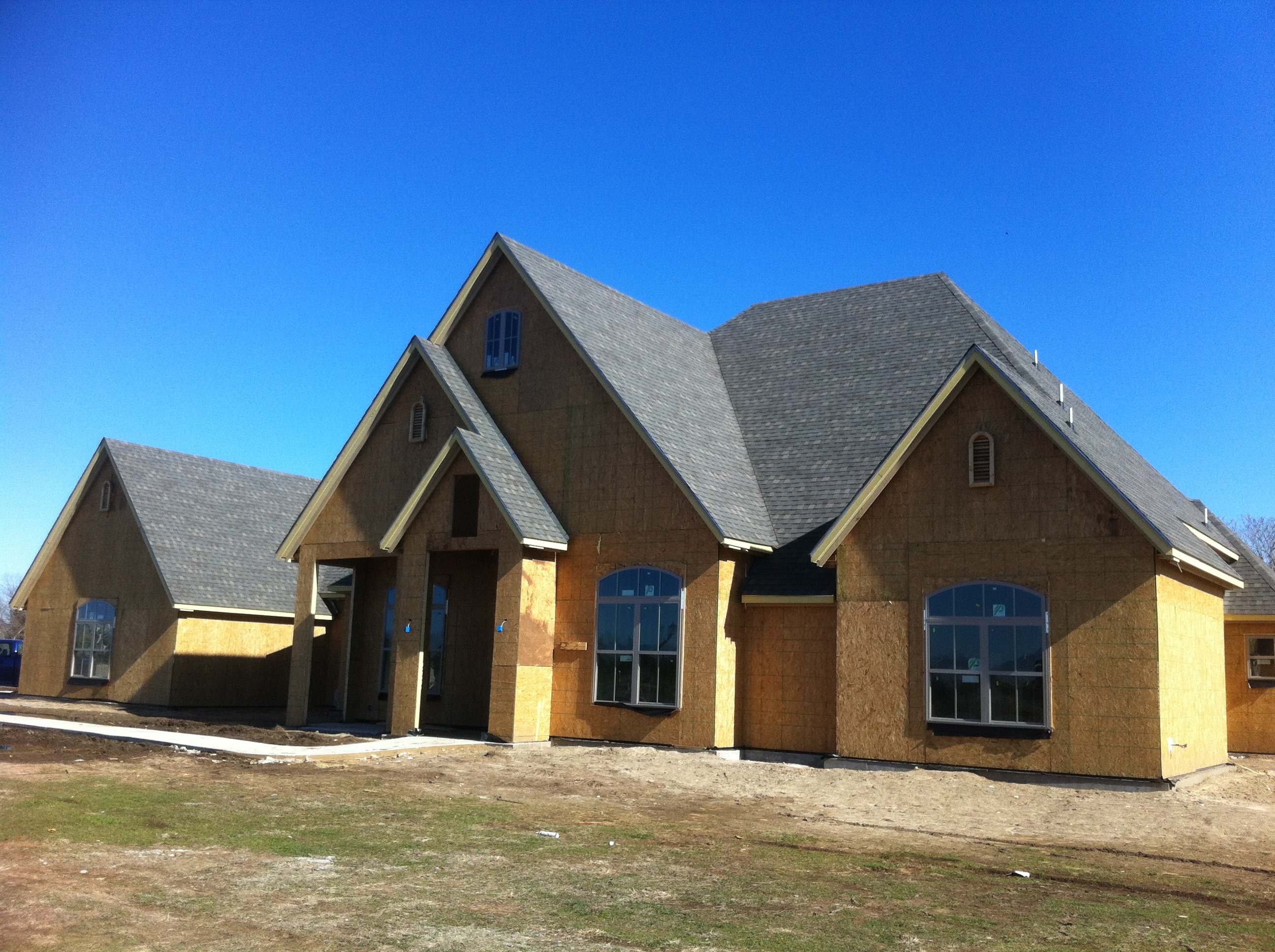Americana Roofing showcases expert craftsmanship with quality roofing solutions for your new home.