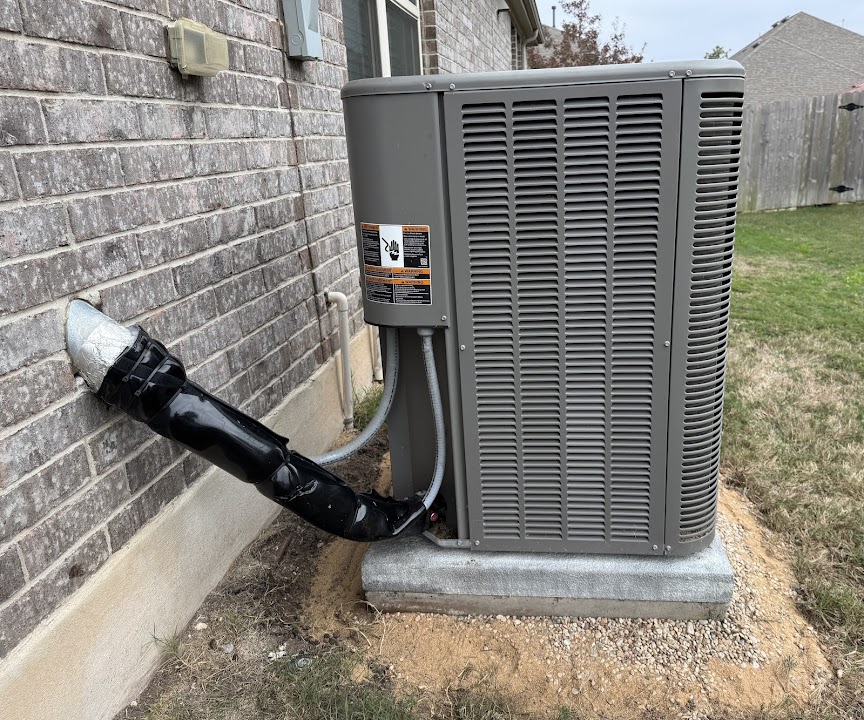 Abacus Plumbing, Air Conditioning, & Electrical demonstrates reliable outdoor HVAC installation with durable mounting and tidy line routing for long-term performance.