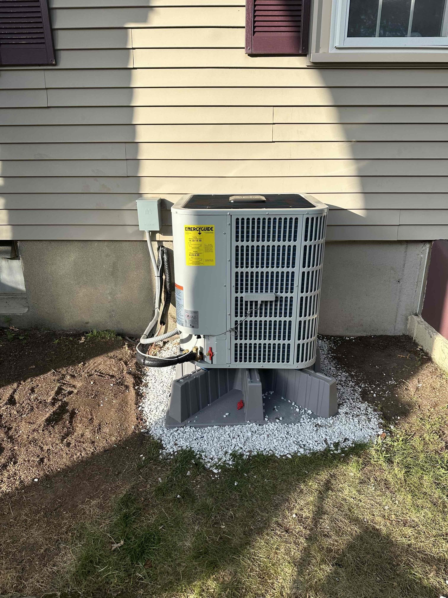 Akian Plumbing, Heating, Cooling & Electric professionally installed this outdoor condenser with clean line routing and site preparation for lasting performance.