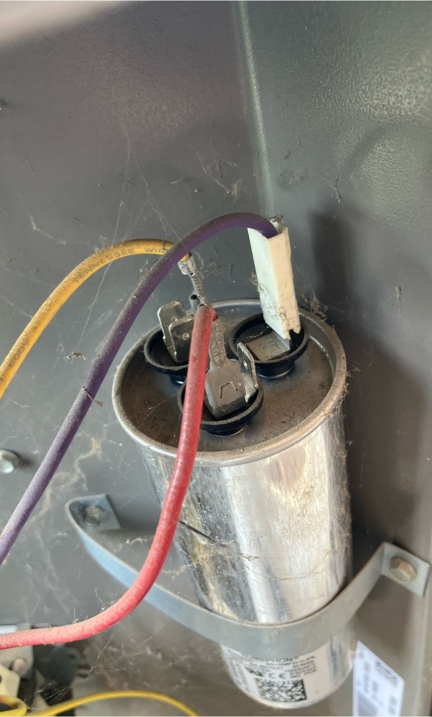 Showcasing careful component inspection and service transparency, Abacus Plumbing, Air Conditioning, & Electrical documents capacitor and wiring condition for safe repairs.