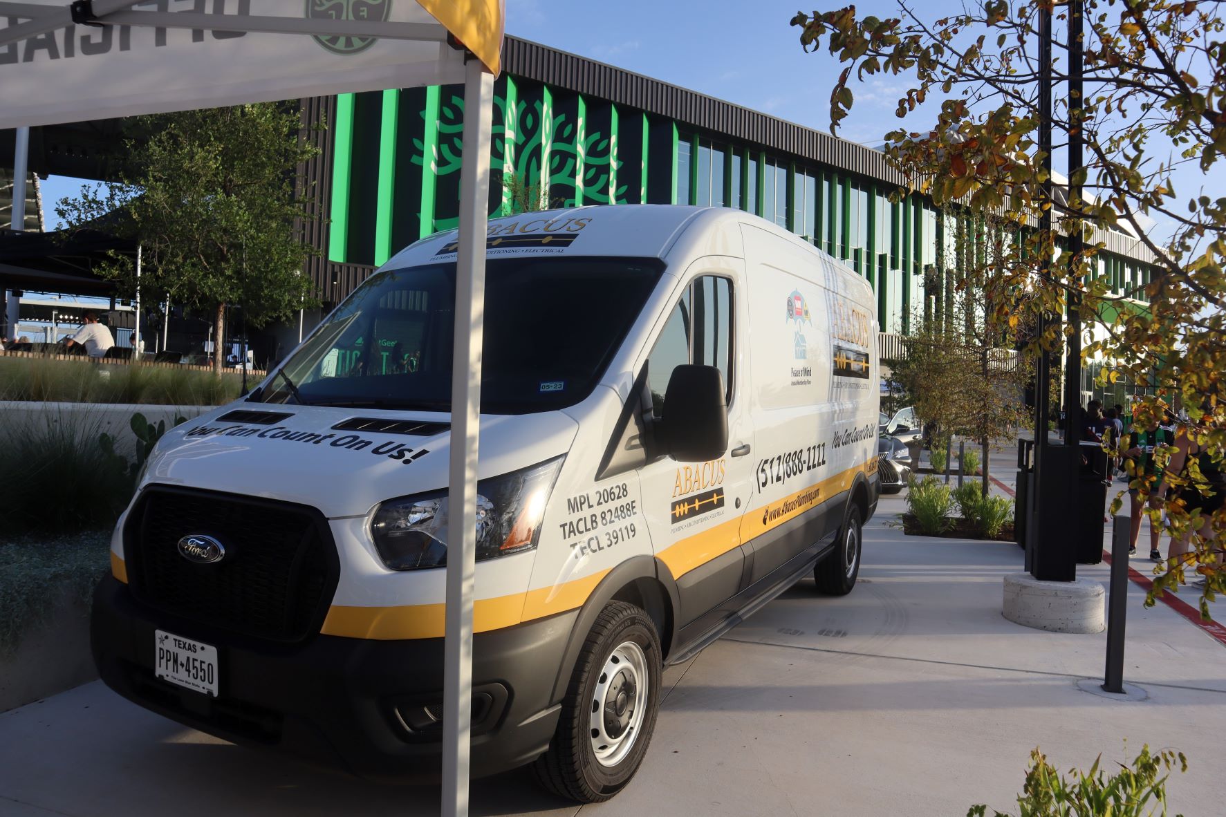 A clean, professional service van from Abacus Plumbing, Air Conditioning, & Electrical showcases dependable craftsmanship and community presence.