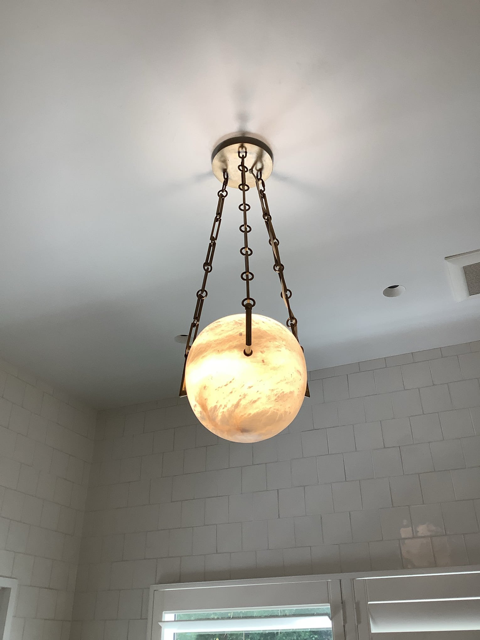 Powell Electric delivers secure, professionally installed lighting that enhances bathroom style while providing warm, reliable illumination.