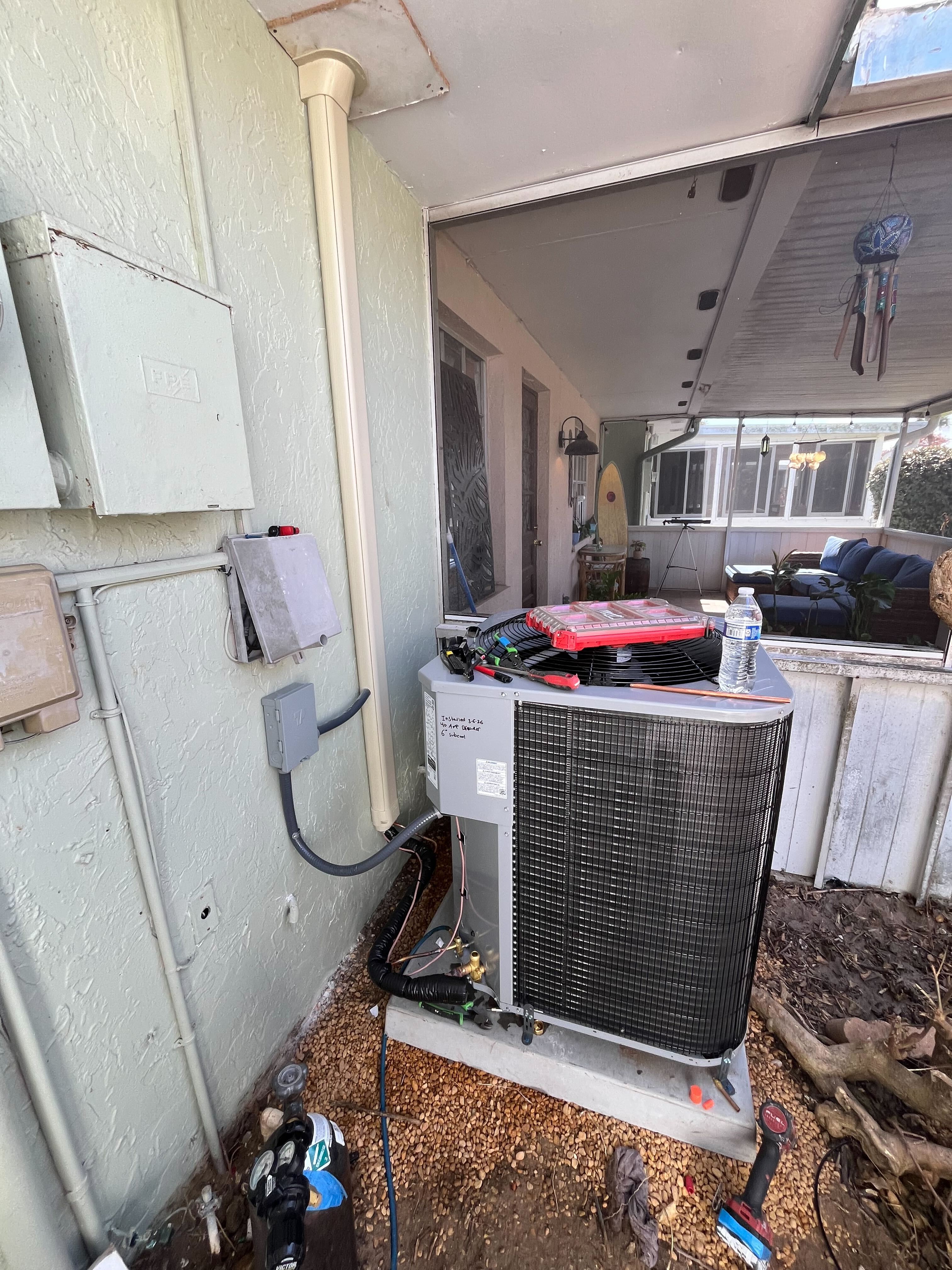 Skilled technicians from Climate Experts Air, Plumbing & Electric demonstrate careful, on-site AC service to keep your home comfortable and efficient.