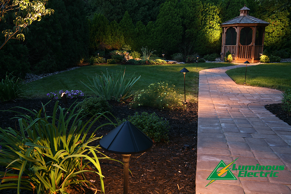 Transform your outdoor space into an enchanting retreat with Luminous Electric's expert lighting solutions, crafting the perfect ambiance for any occasion.