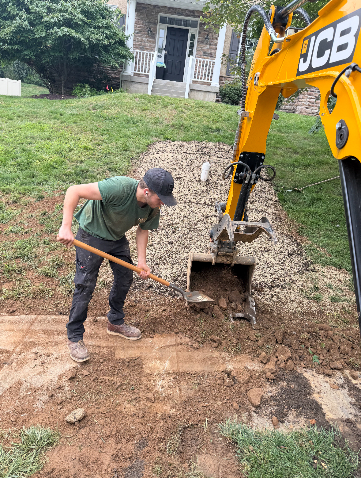Dream Team - Plumbing, Heating, Cooling, & Electric demonstrates expert handling of heavy equipment, ensuring your home projects are managed with precision and care.