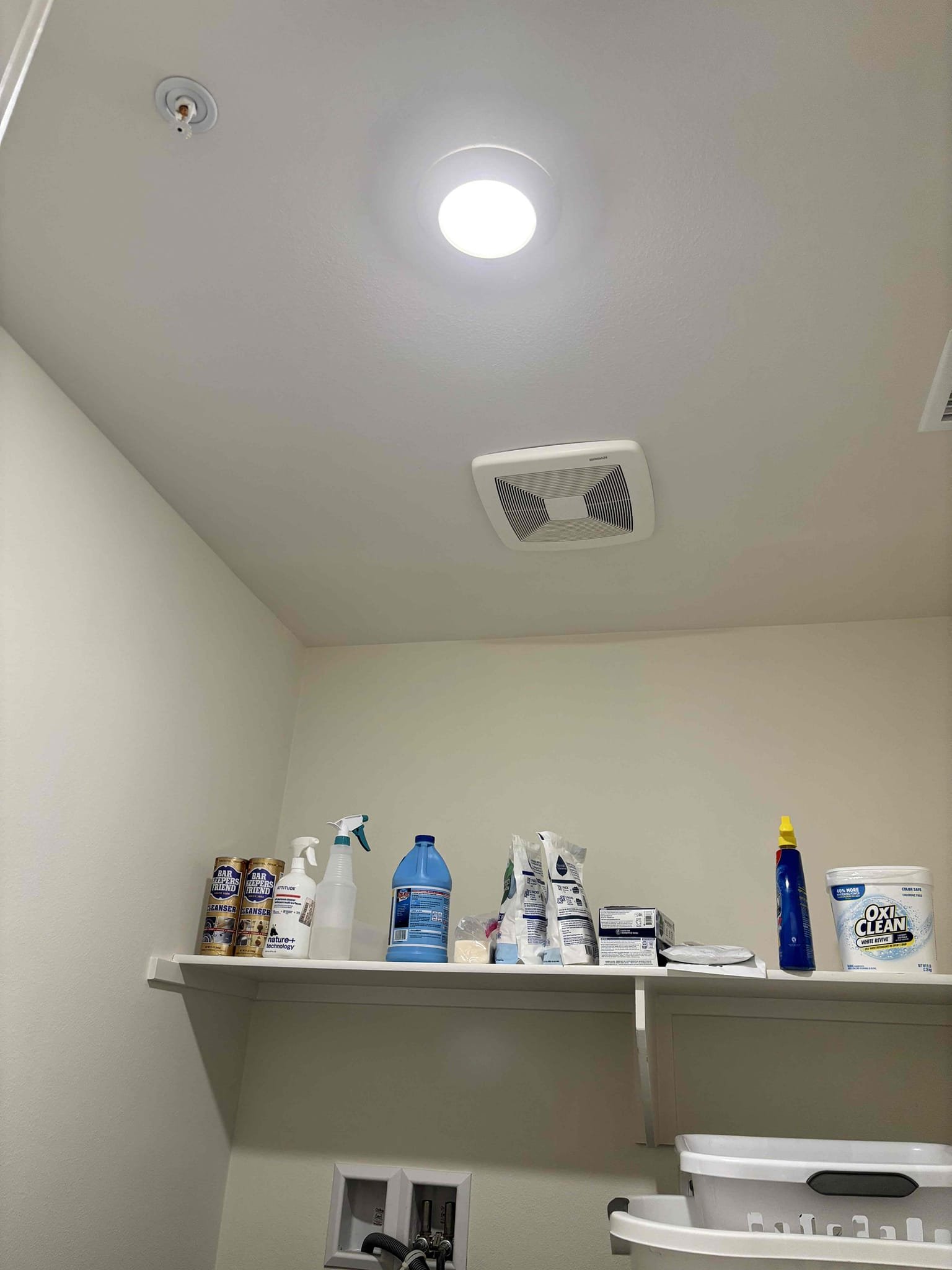 Bright, neatly installed ceiling fixtures and vent show Powell Electric’s commitment to safe, professional workmanship in your home.