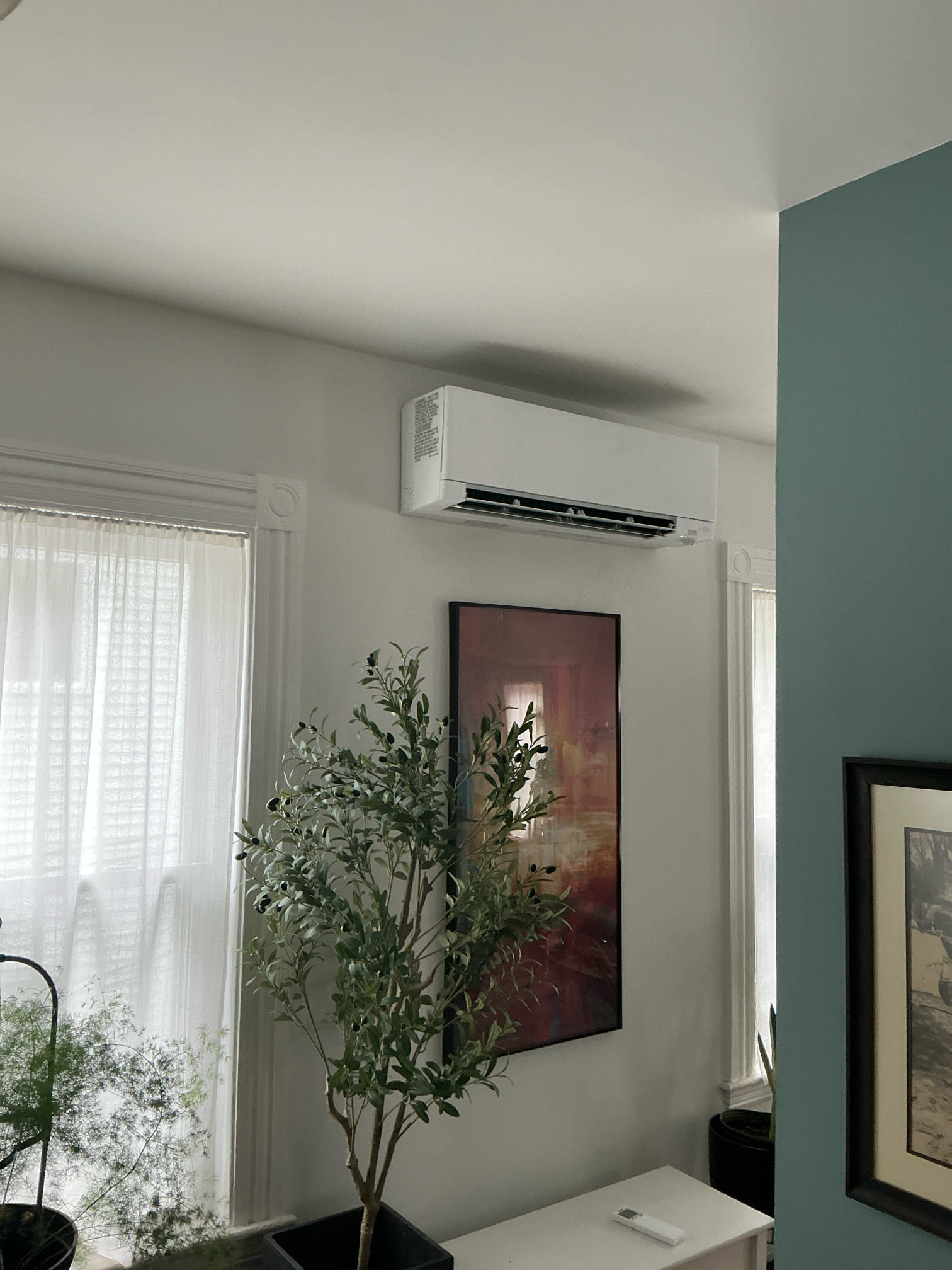 Comfort and quiet reliability are visible in this neat ductless installation, trust Akian Plumbing, Heating, Cooling & Electric for clean, professional results.