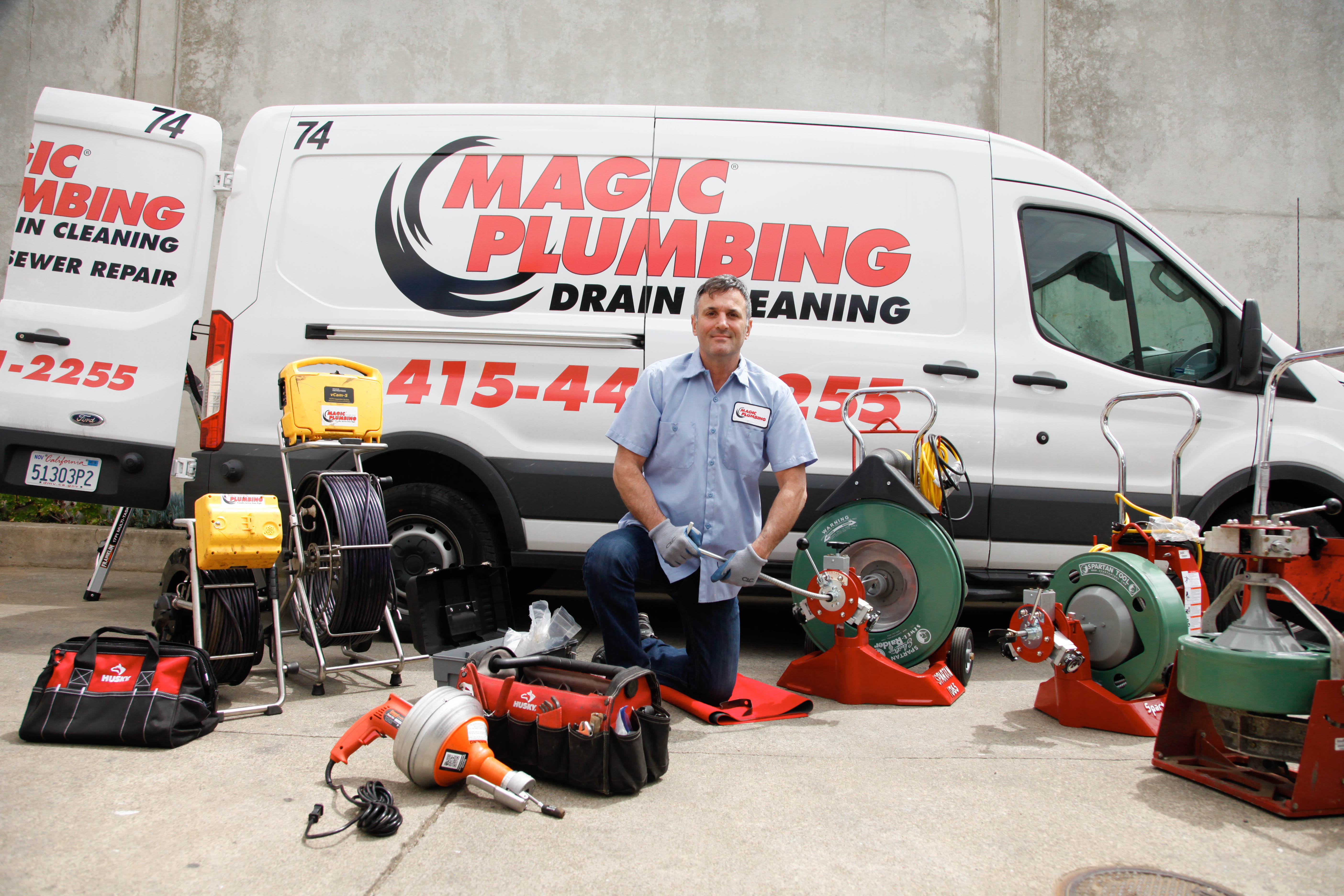 Confident and ready for every call, Magic Plumbing Heating & Cooling showcases professional drain cleaning crews and equipment for reliable service.