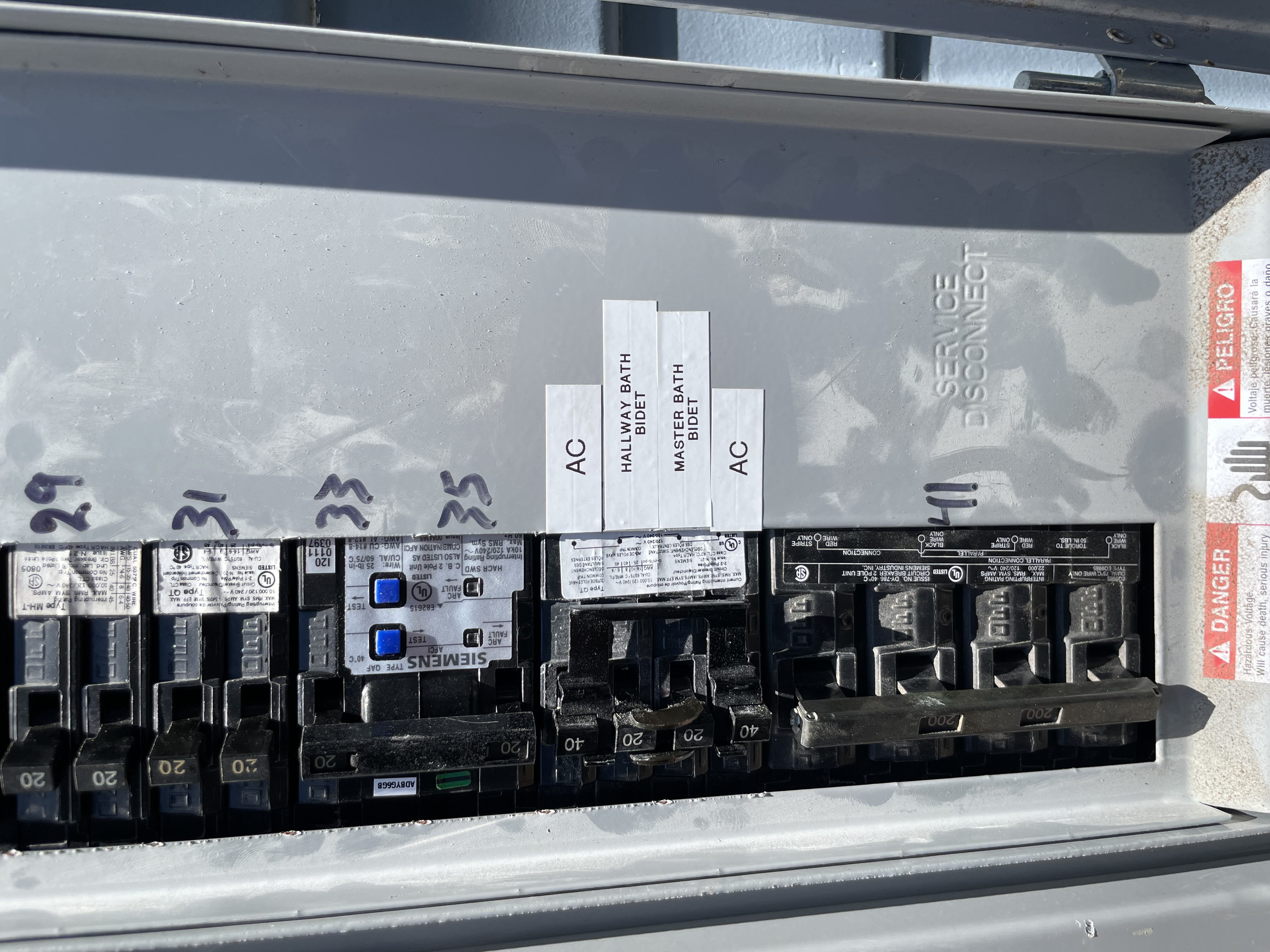 Powell Electric demonstrates careful, safety-focused electrical work with clearly labeled circuits and a tested AFCI/GFCI breaker for reliable protection.