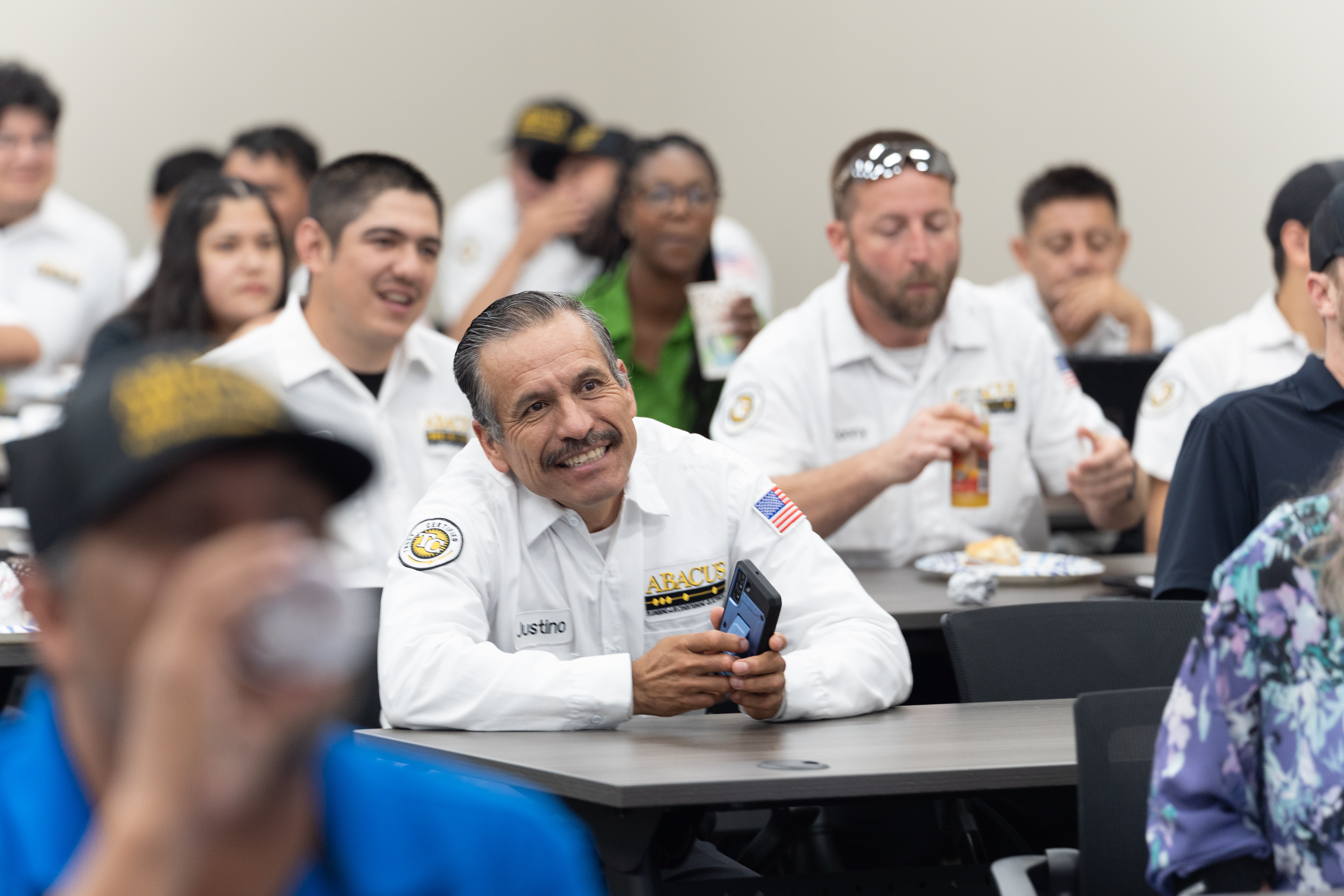 Our team shows commitment to professional training and customer care at Abacus Plumbing, Air Conditioning, & Electrical during a recent staff session.
